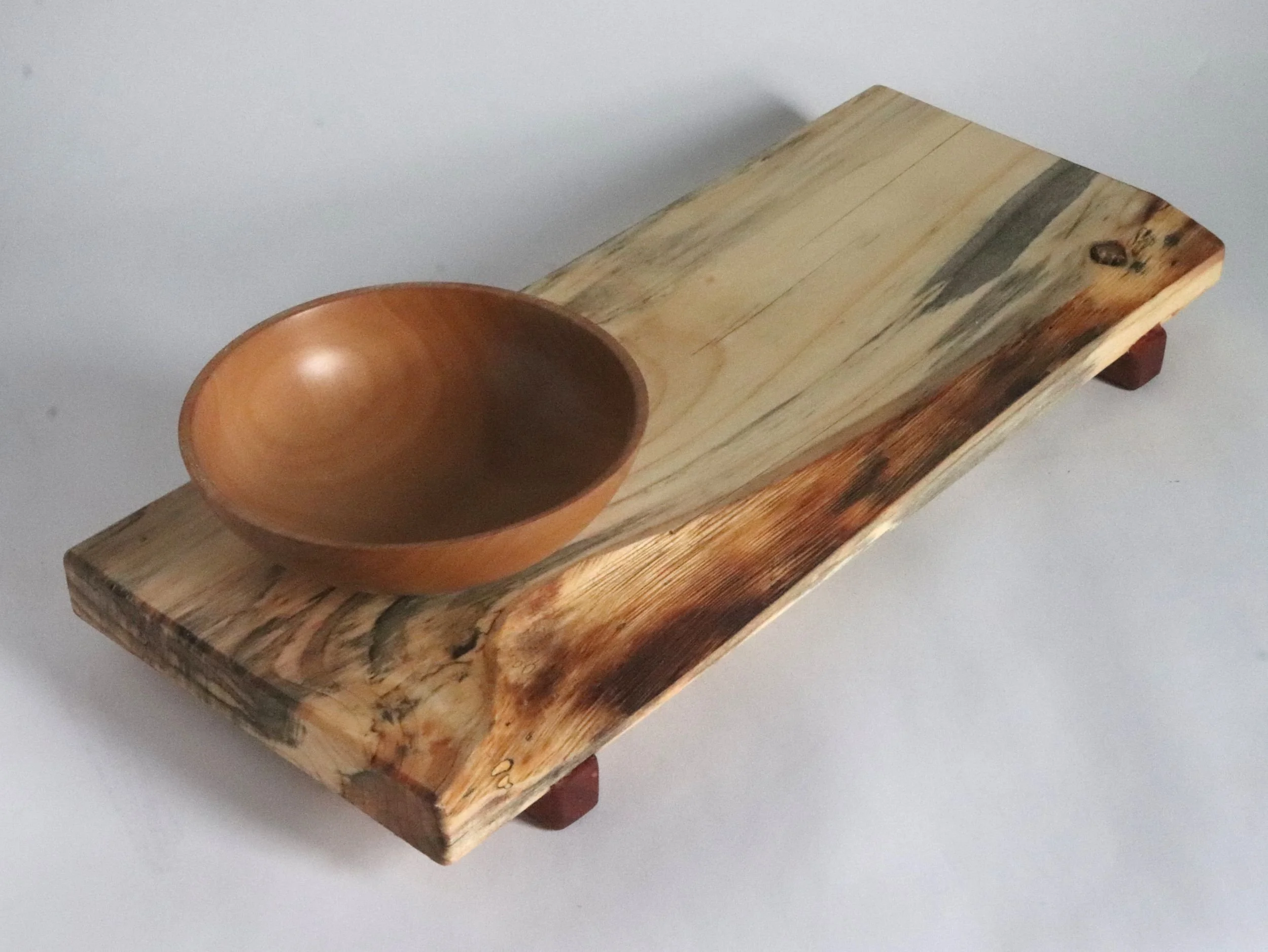 Artisan wood serving tray featuring unique natural edge variation, spalted spruce with gray streaking and reclaimed pear wood bowl