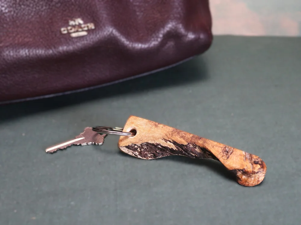 One of a kind Keychain