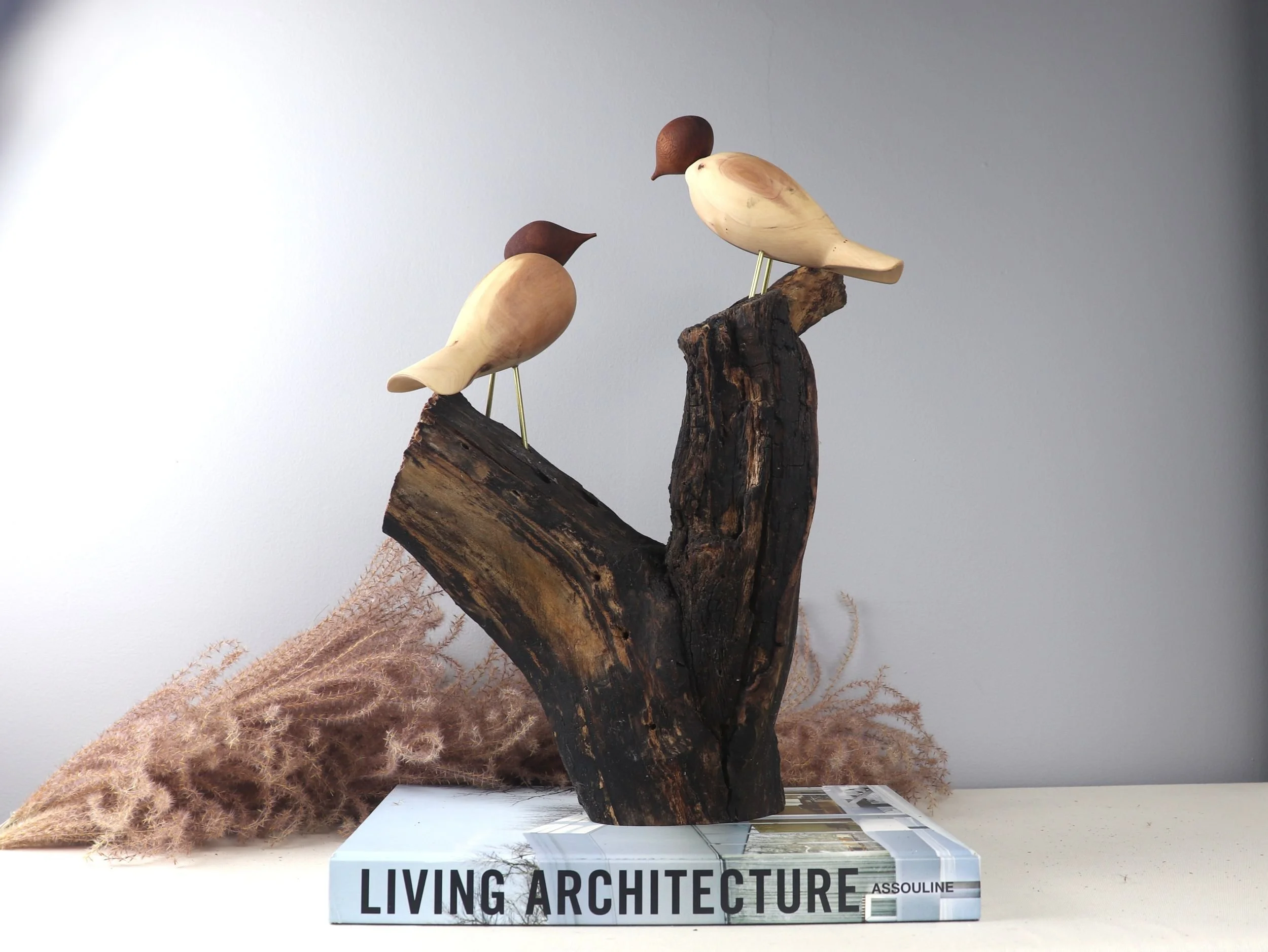 Handmade Birds in Love dogwood sculpture with two carved birds on natural branch, front angle view