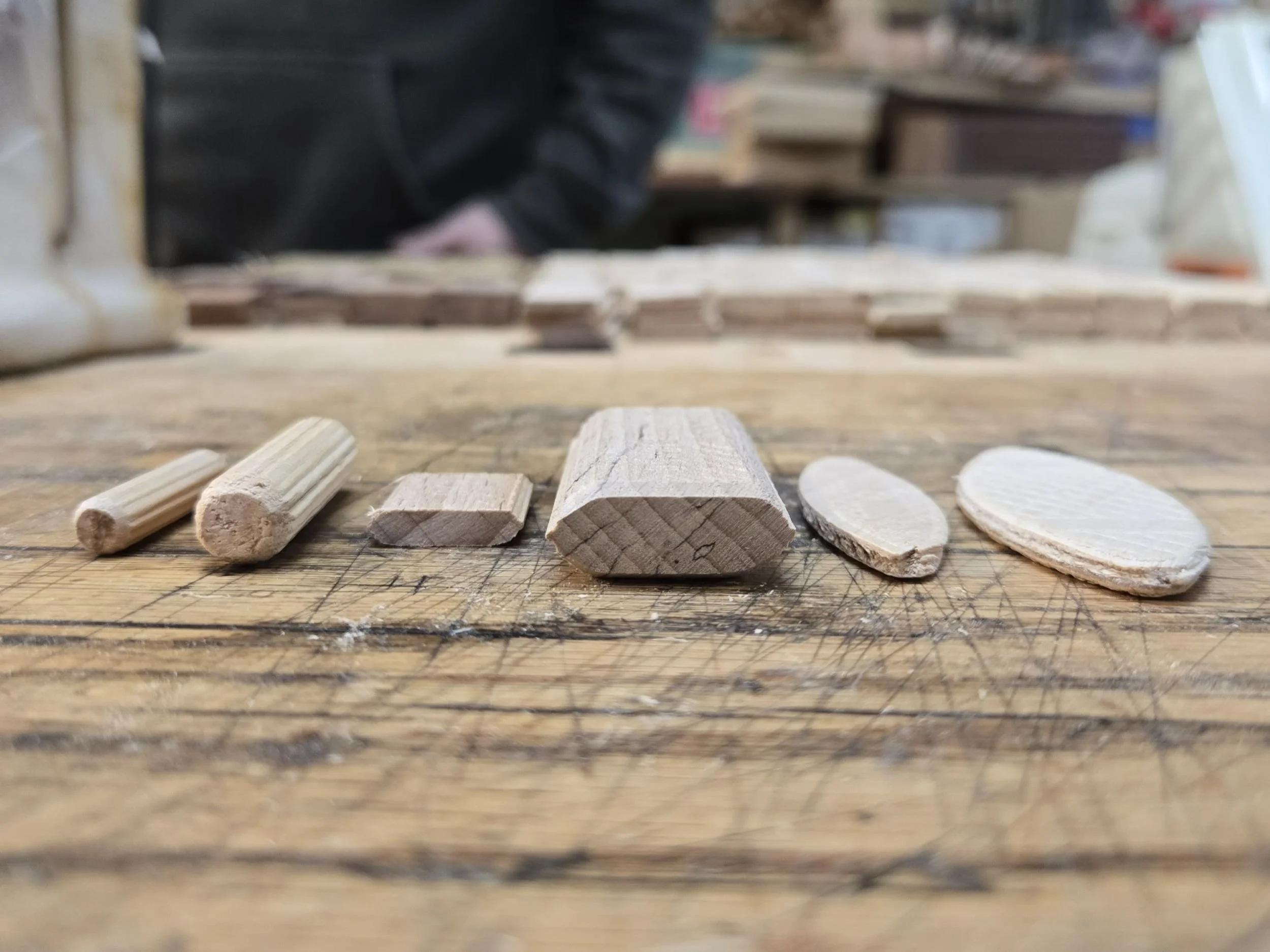 pictured left to right dowl, domino and biscuit used in woodworking