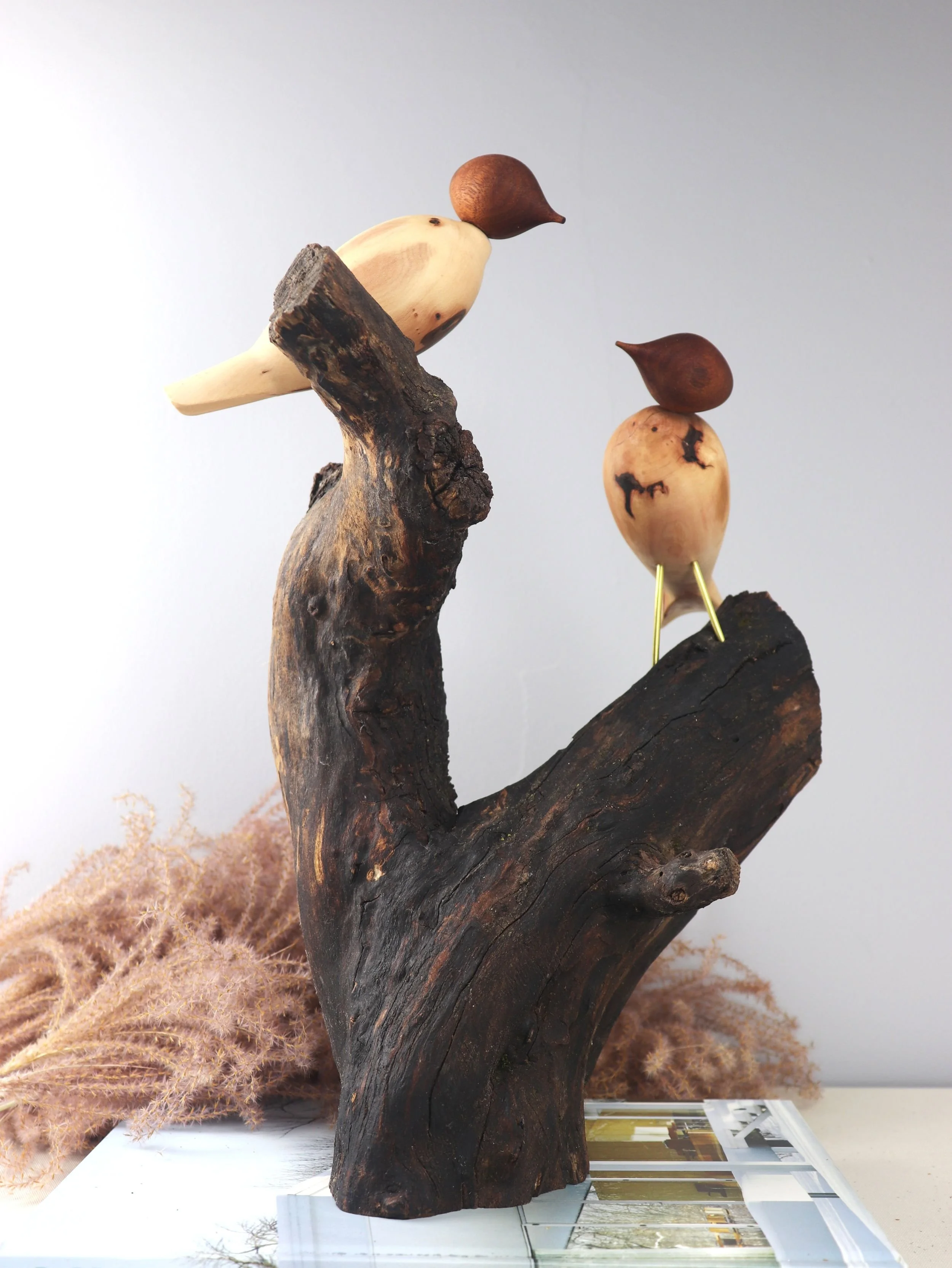 Vertical composition of Birds in Love sculpture highlighting 17.5 inch height and artistic proportions