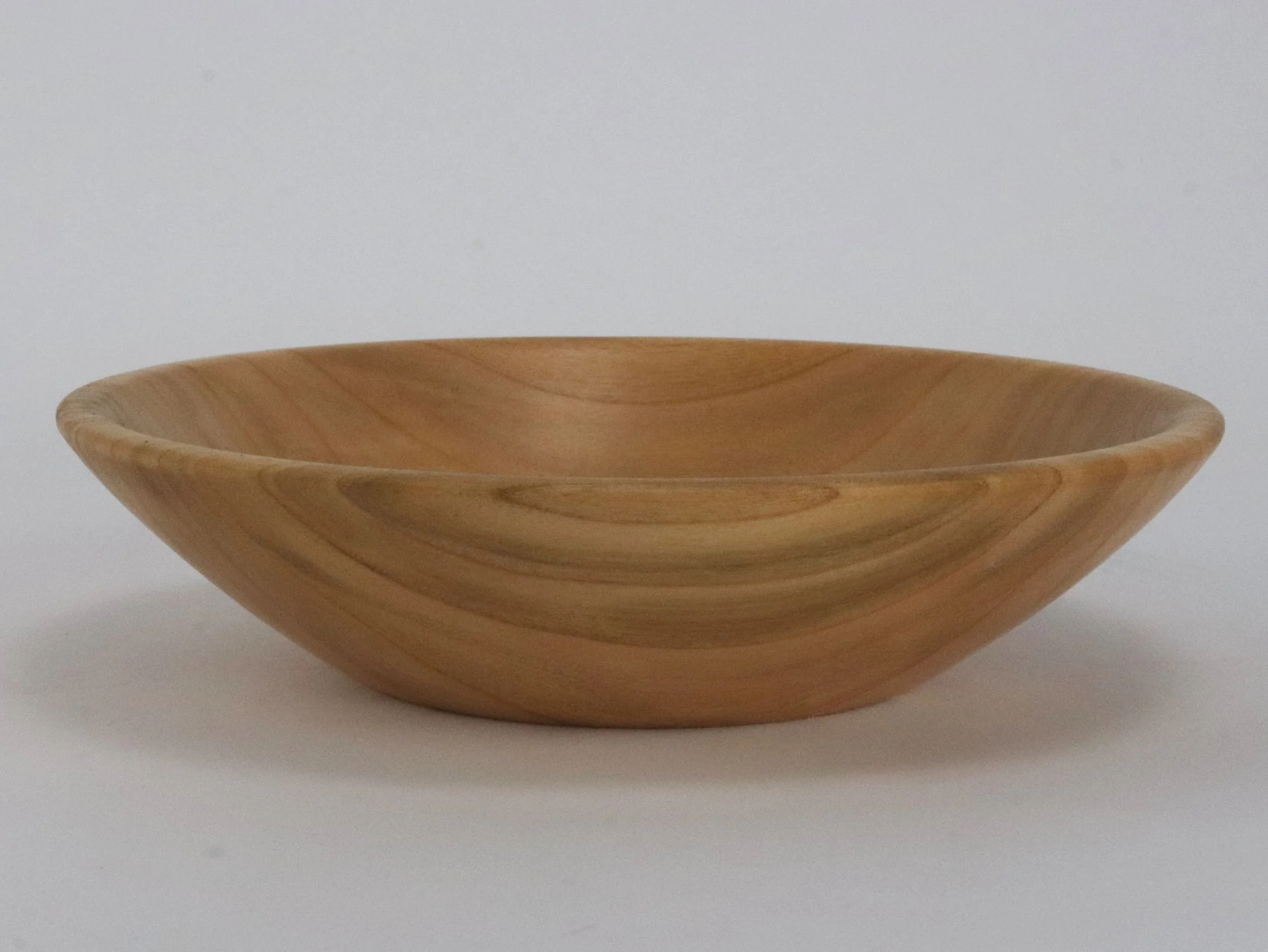 Handmade natural maple wood bowl with food safe finish and lathe-turned craftsmanship