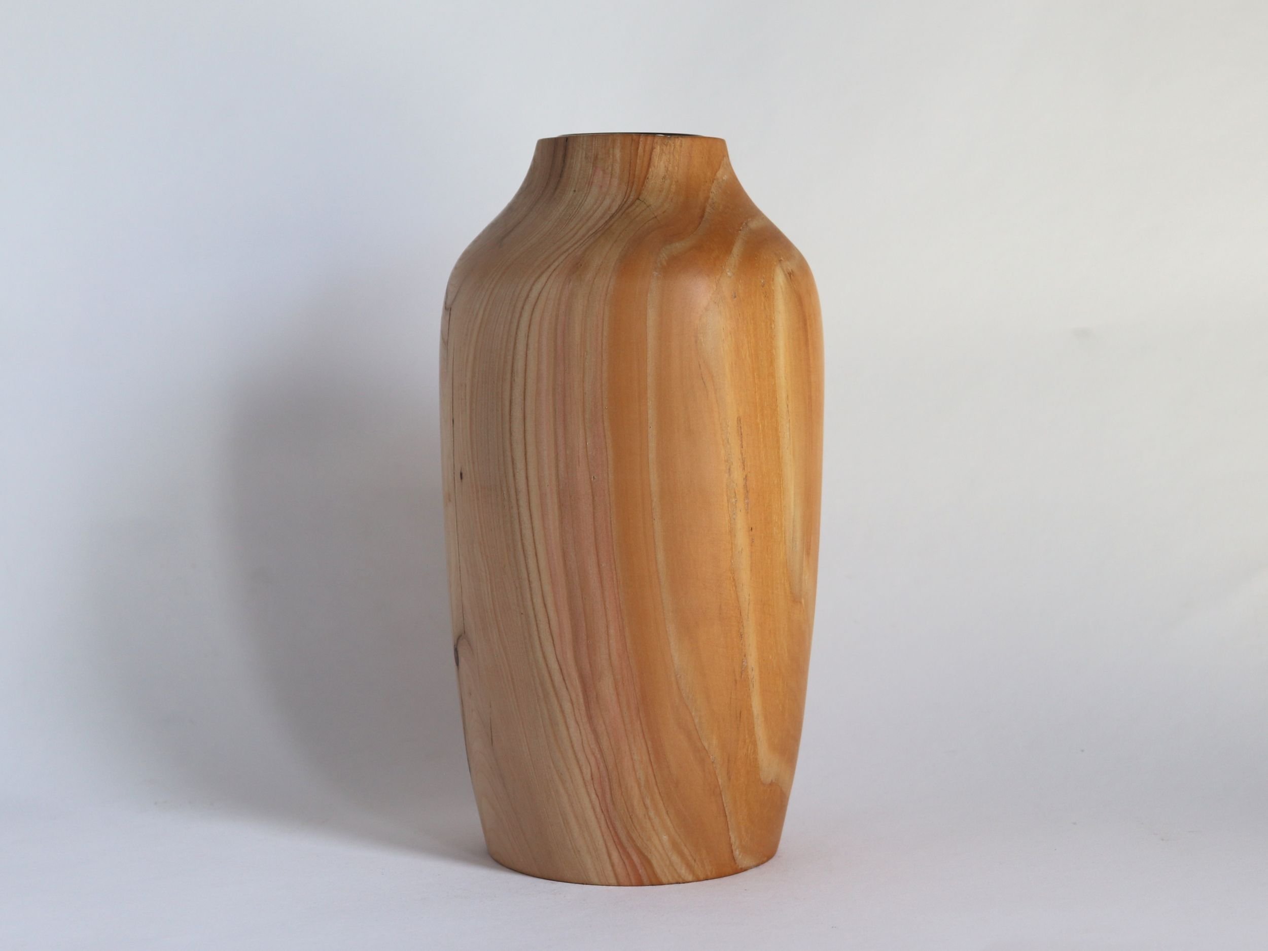 One-of-a-kind wooden flower vessel handcrafted from reclaimed timber by artisan Doug Hill
