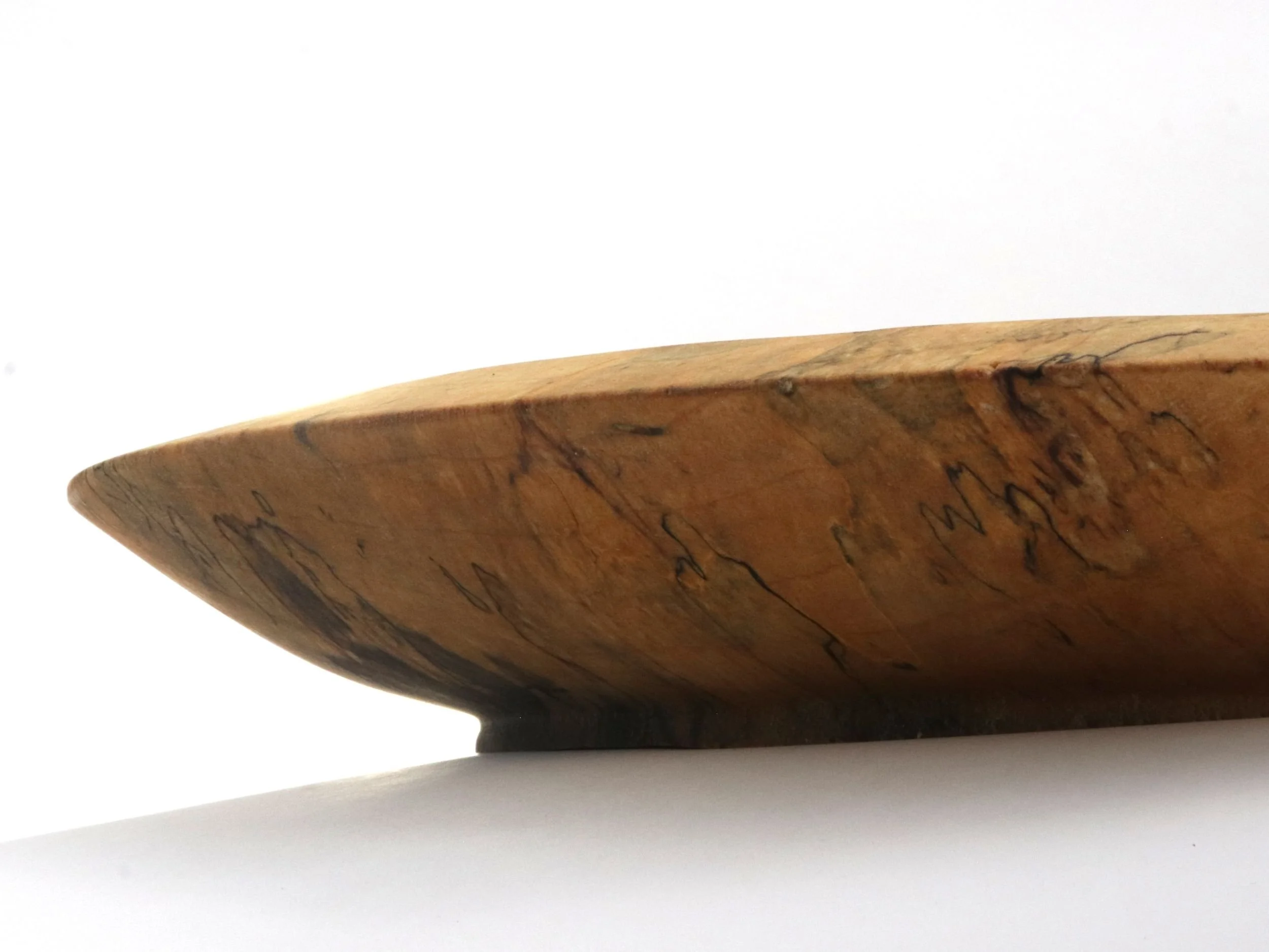 view of underside of spalted maple serving bowl