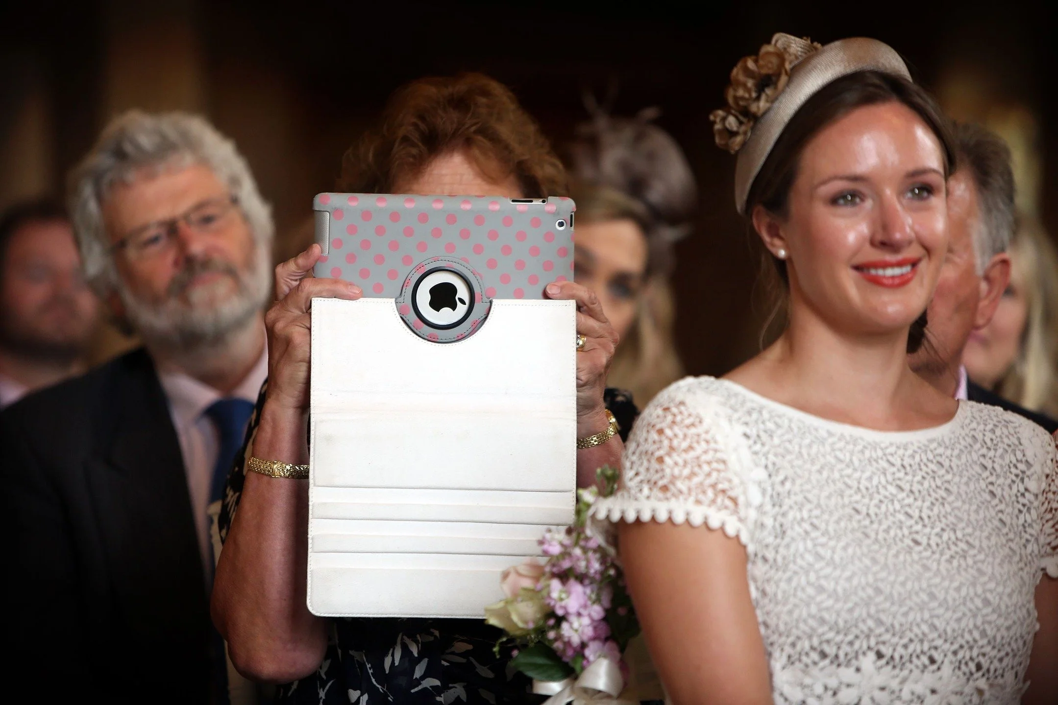 On the website's blog (link in the description), today a piece about unplugging weddings, removing cameras from your guests' hands.

In many ways, it is still the great wedding camera debate.

Relatives hidden behind an iPad. Guests, halfway up the a