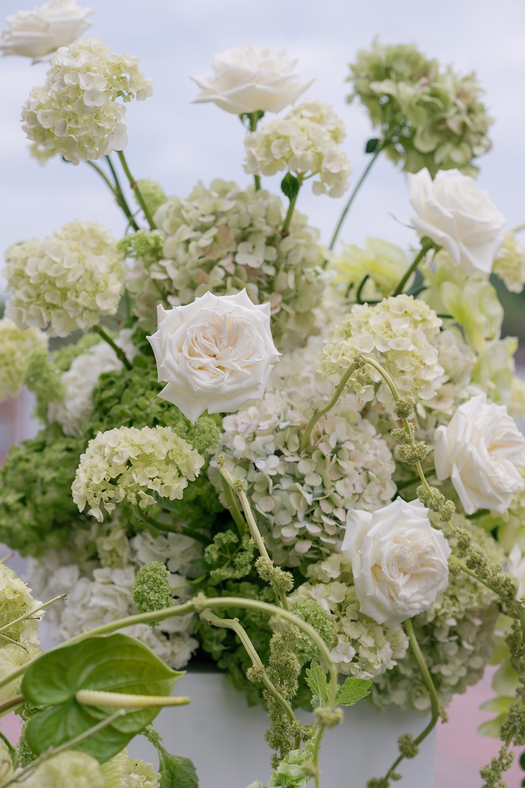 Green and white ceremony pedestal arrangement | JW Marriott Plant Riverside | Savannah, GA | Photographer Christina Lynn Mitro | Florals Peachy Keene Flower Farm