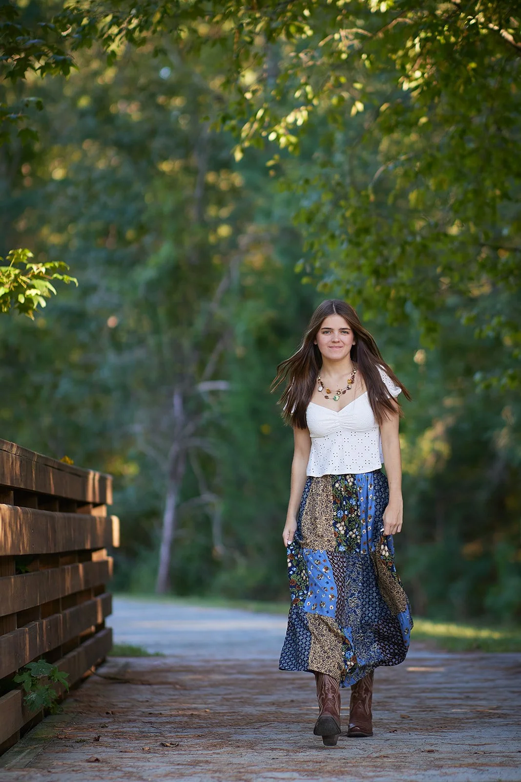 senior walking across bridge.jpg
