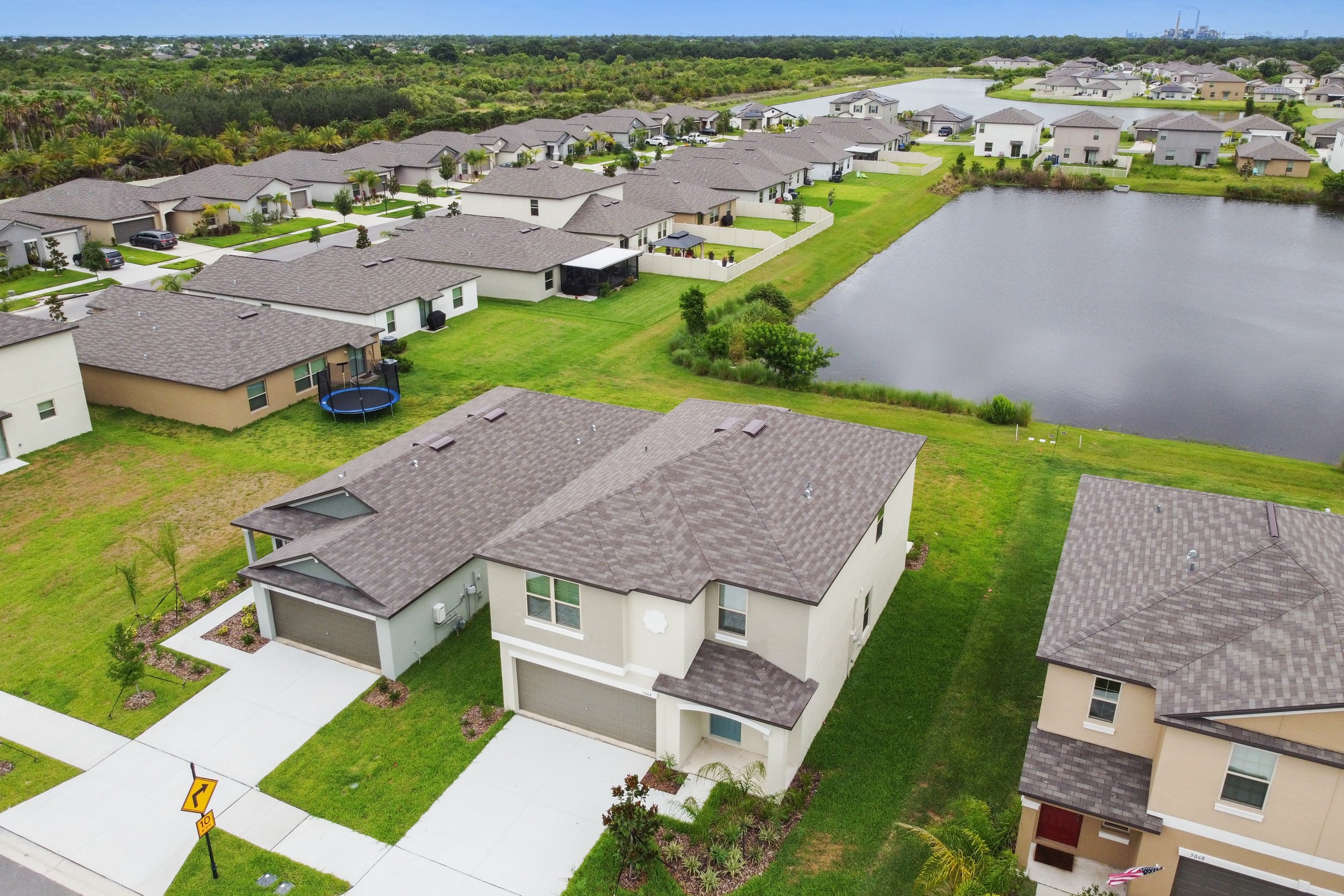 Beyond the front door, serene pond views set the tone for this well-maintained five-bedroom, two-and-a-half-bath home, offering 2,215 square feet of thoughtfully designed living space that blends comfort, functionality, and understated elegance.

The