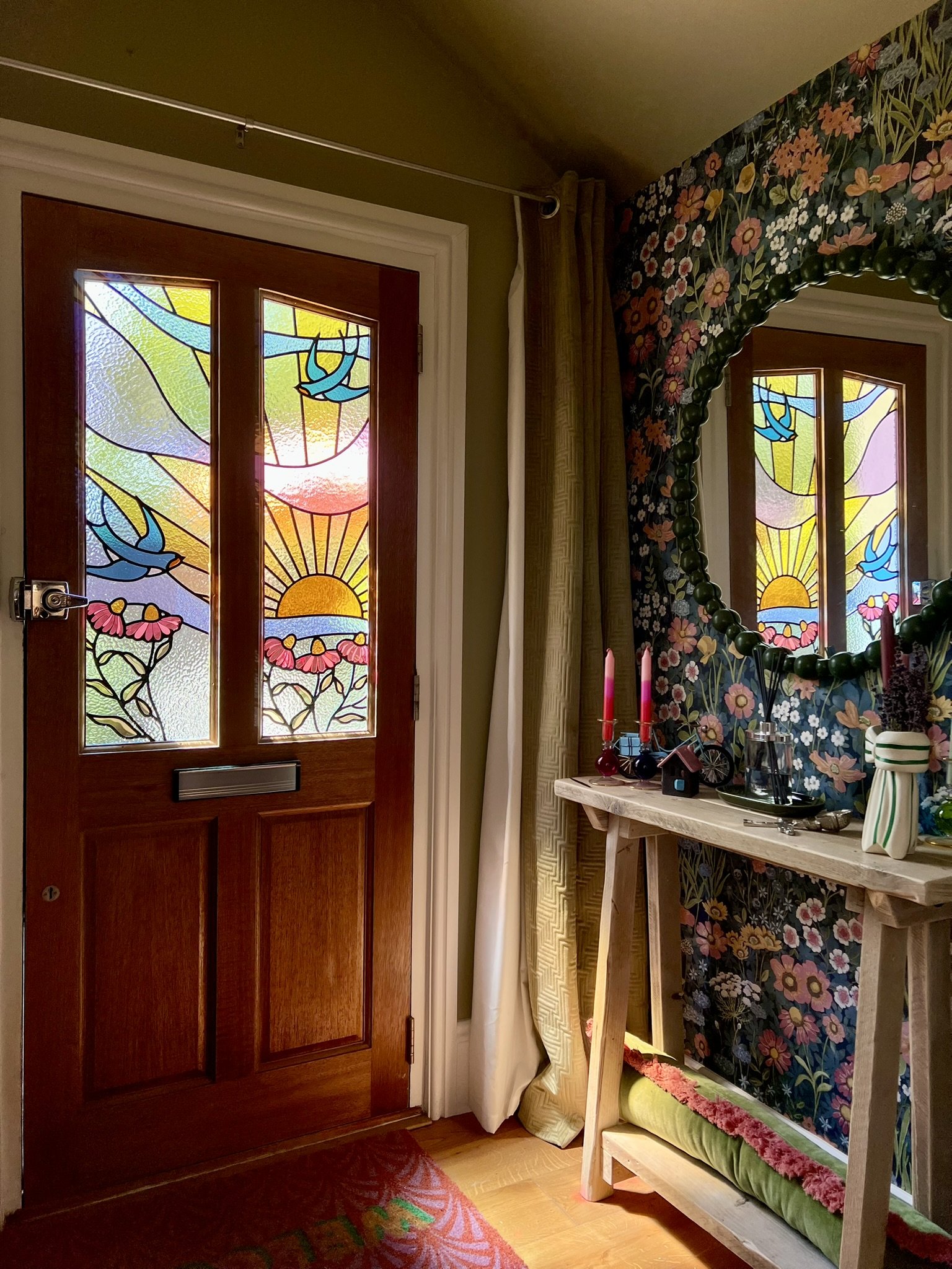maximalist stained glass front door set featuring swallows, a sunset and fuchsia pink cone flowers