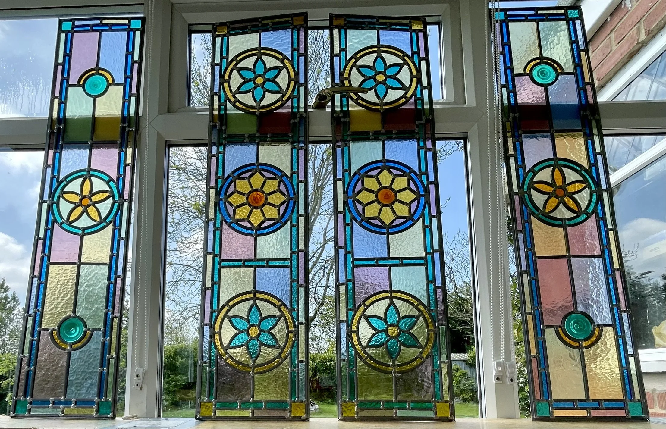 Intricate Victorian Geometric Stained Glass Entrance Set With Floral Motifs