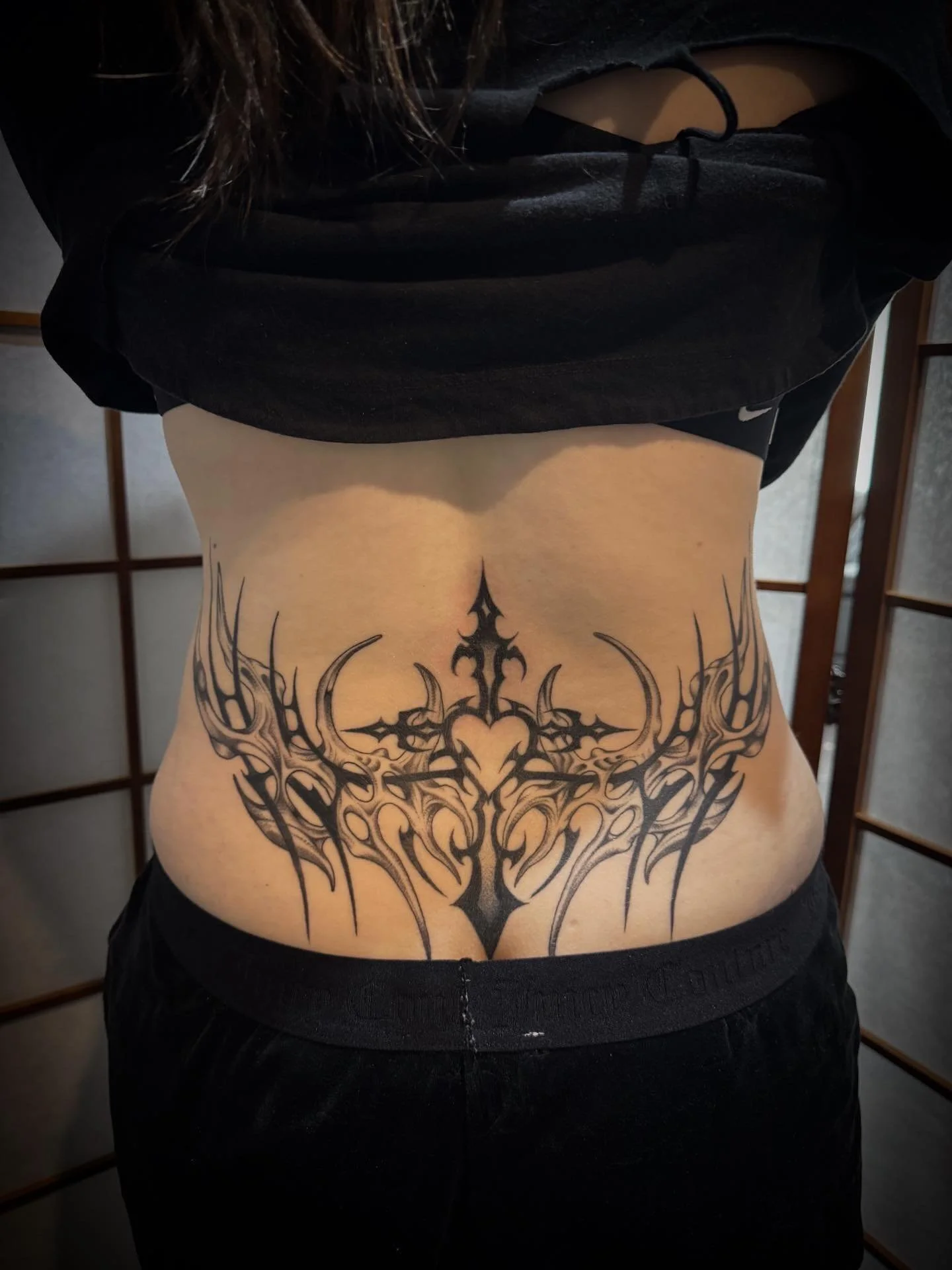 Fully healed lower back piece from a few months ago. Thanks Jess 💗🖤