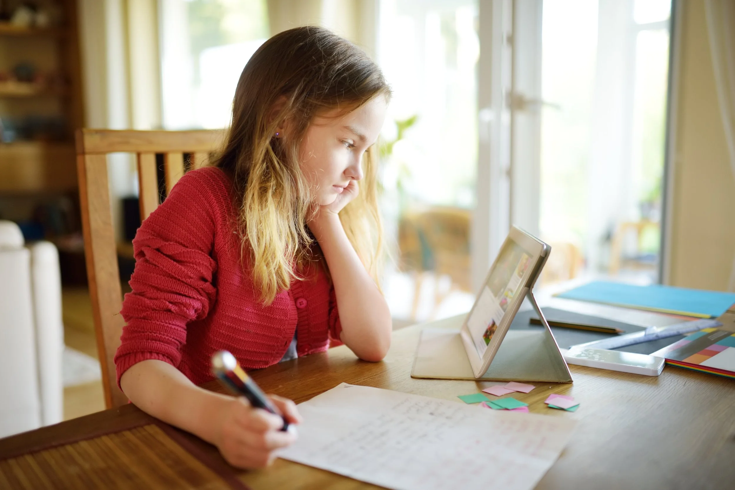 girl studying with ipad