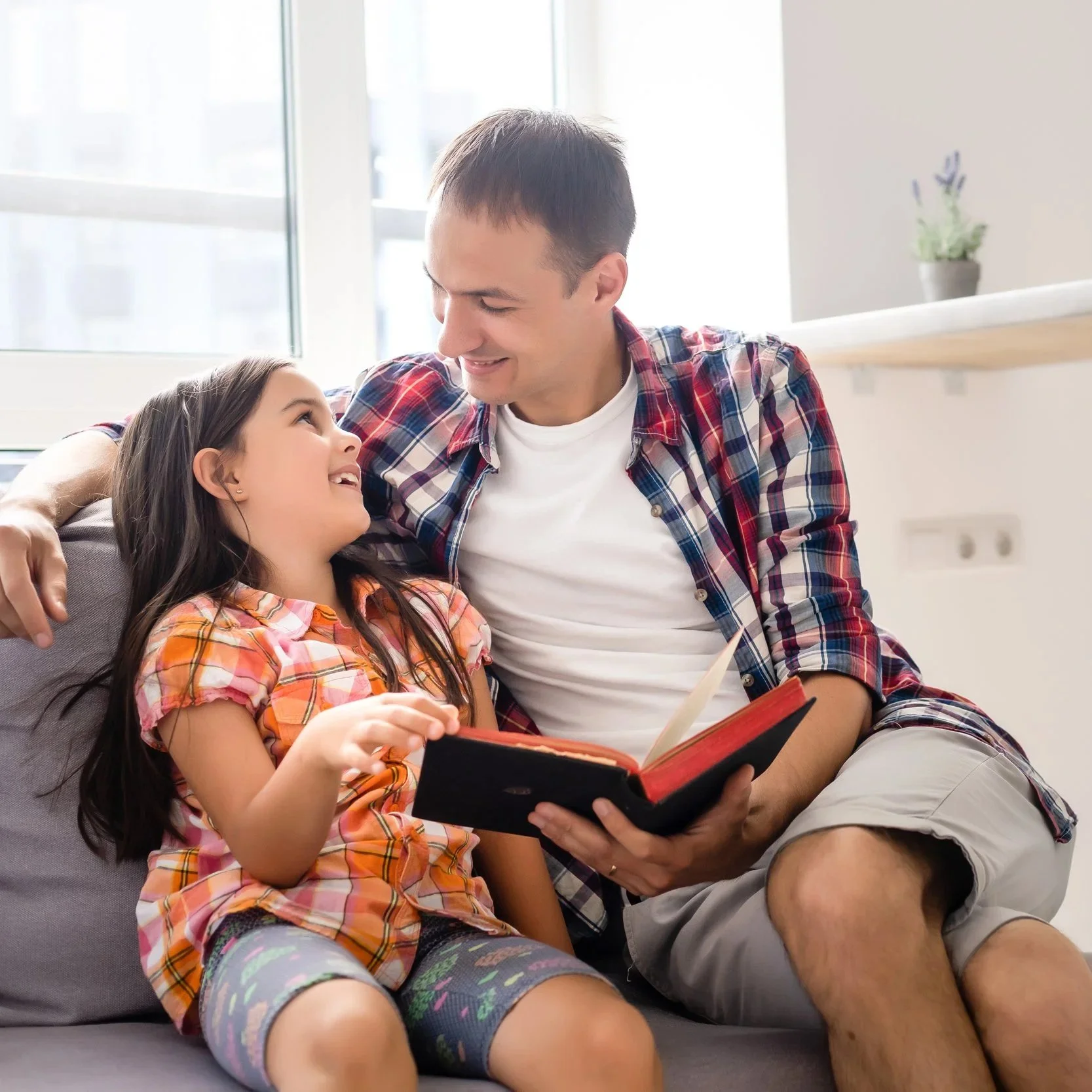 father reading with child