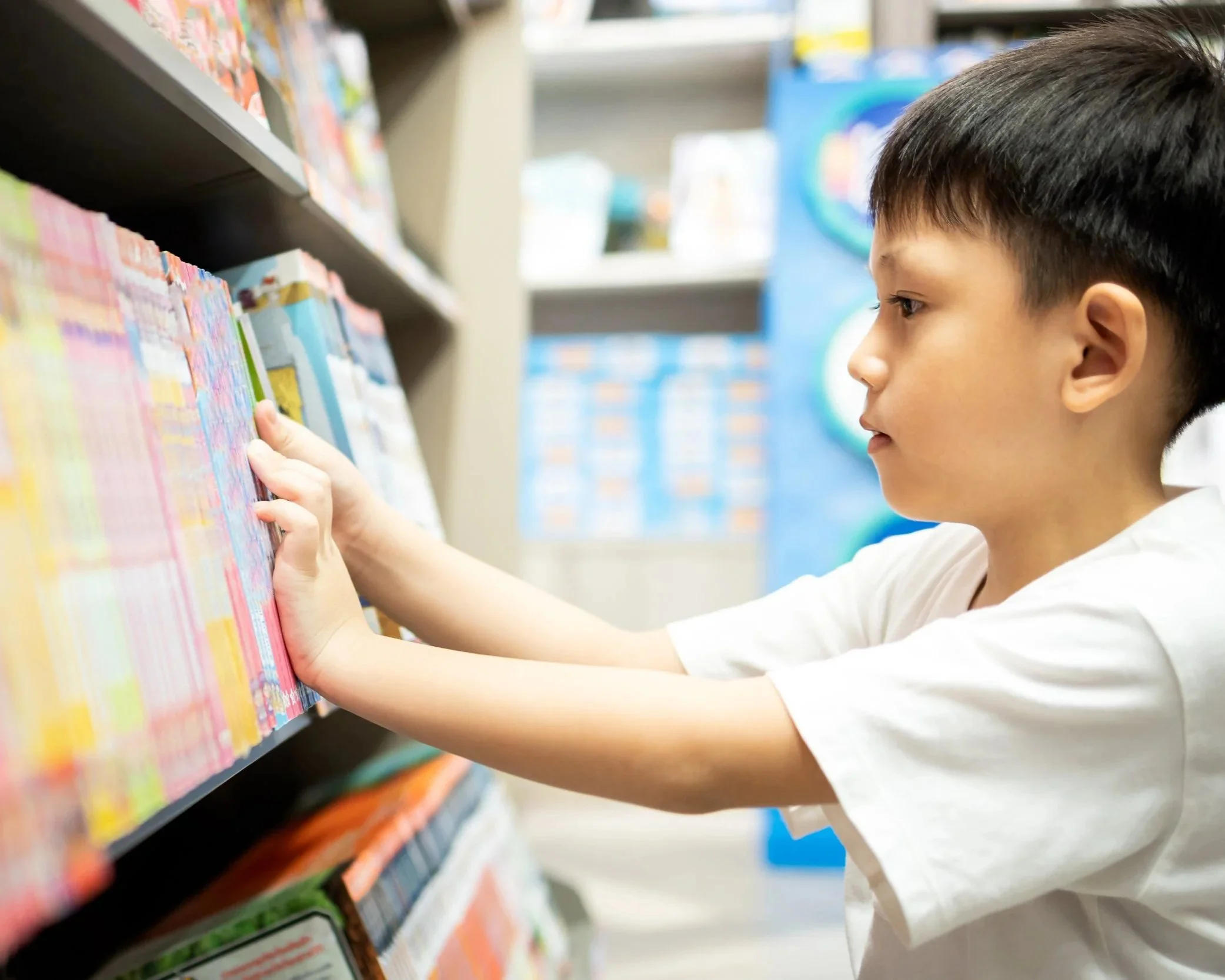boy browsing library books