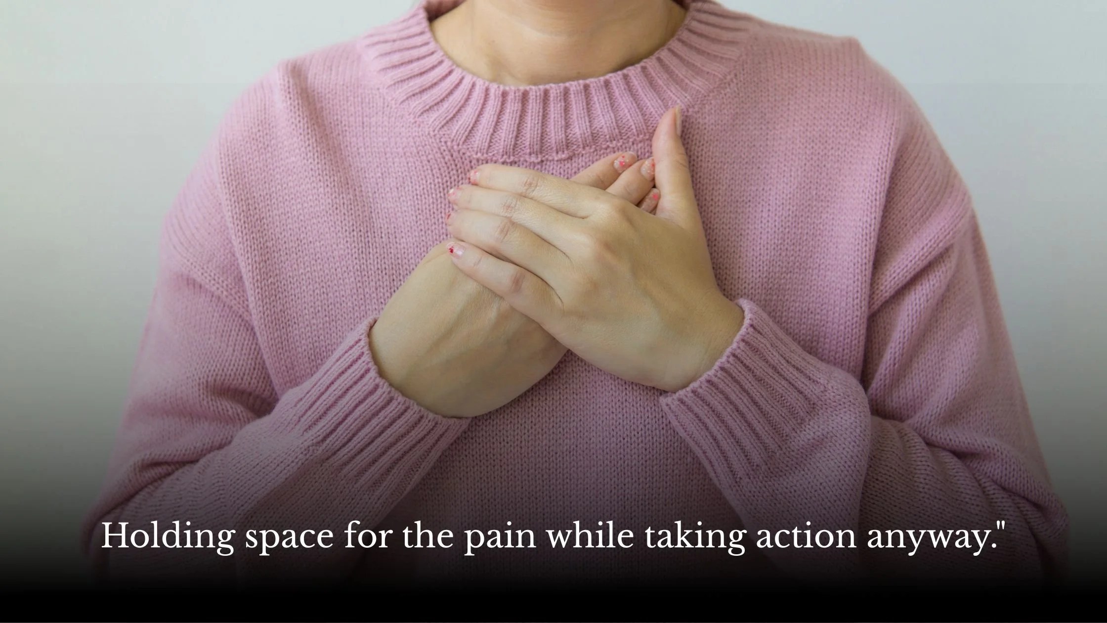 Close-up of hands on chest representing emotional resilience and mindful breathing; Jo Renshaw Life Coach Brighton tips on managing anxiety.