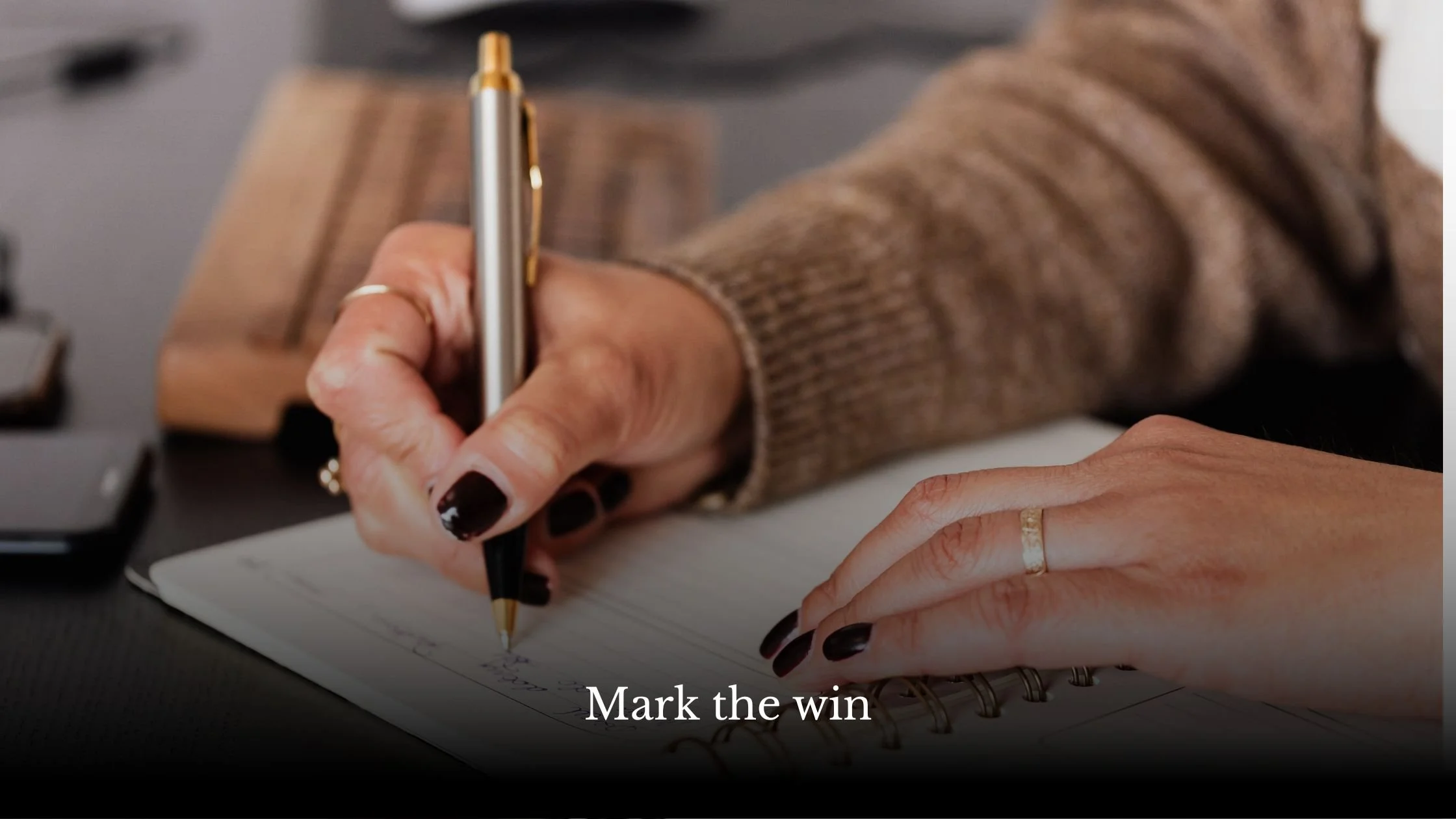 Woman writing a short daily checklist in the morning, tracking self-trust wins, Jo Renshaw Life Coach Brighton blog