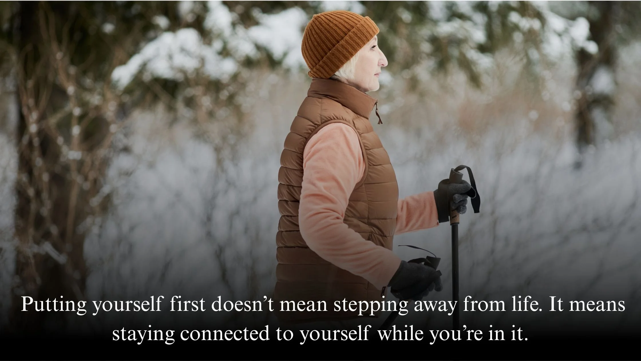 Midlife woman walking alone outdoors in winter, representing self-leadership and choosing herself at Christmas
