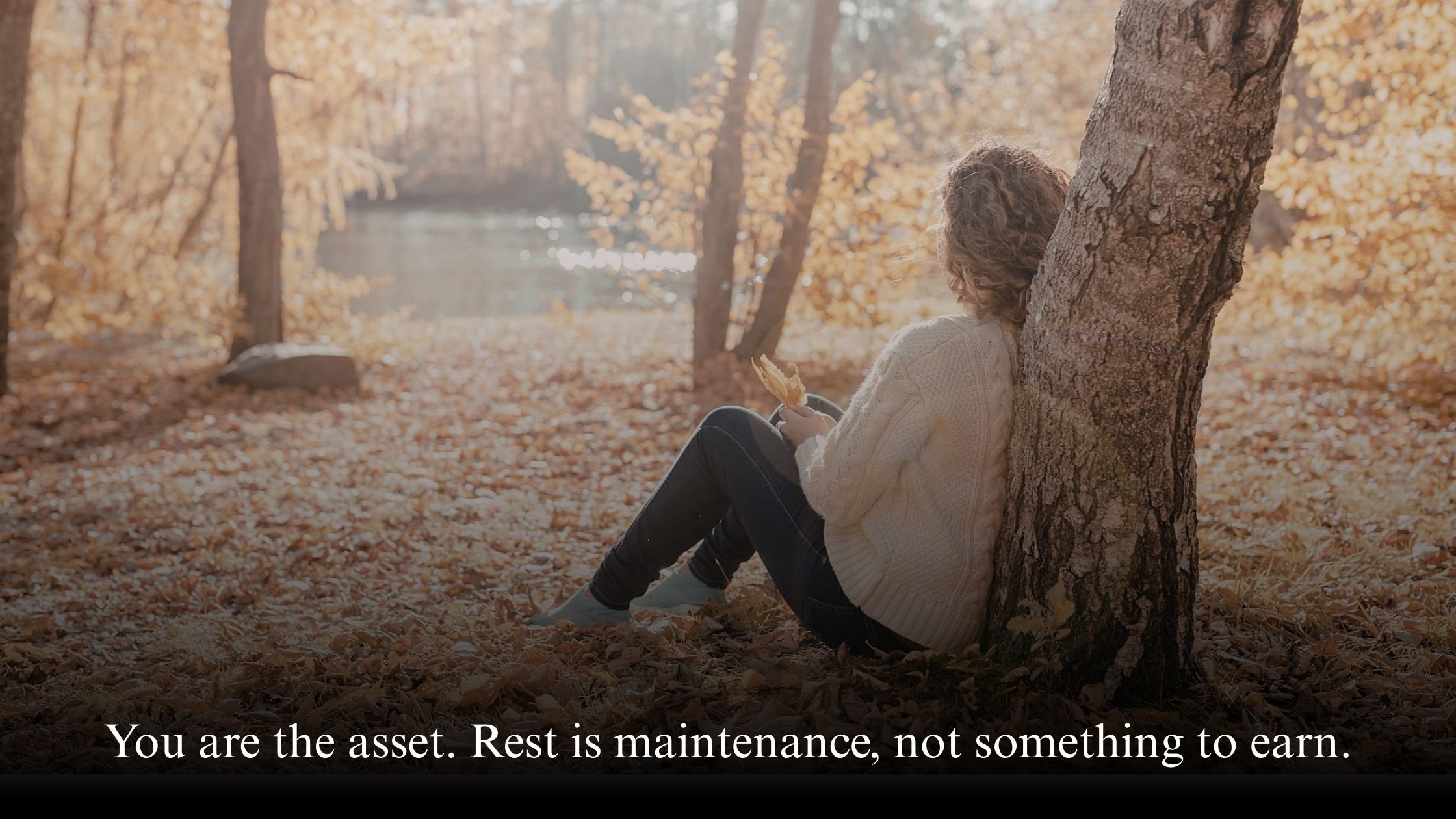 Woman resting outdoors symbolising self-care without guilt and seeing yourself as the asset