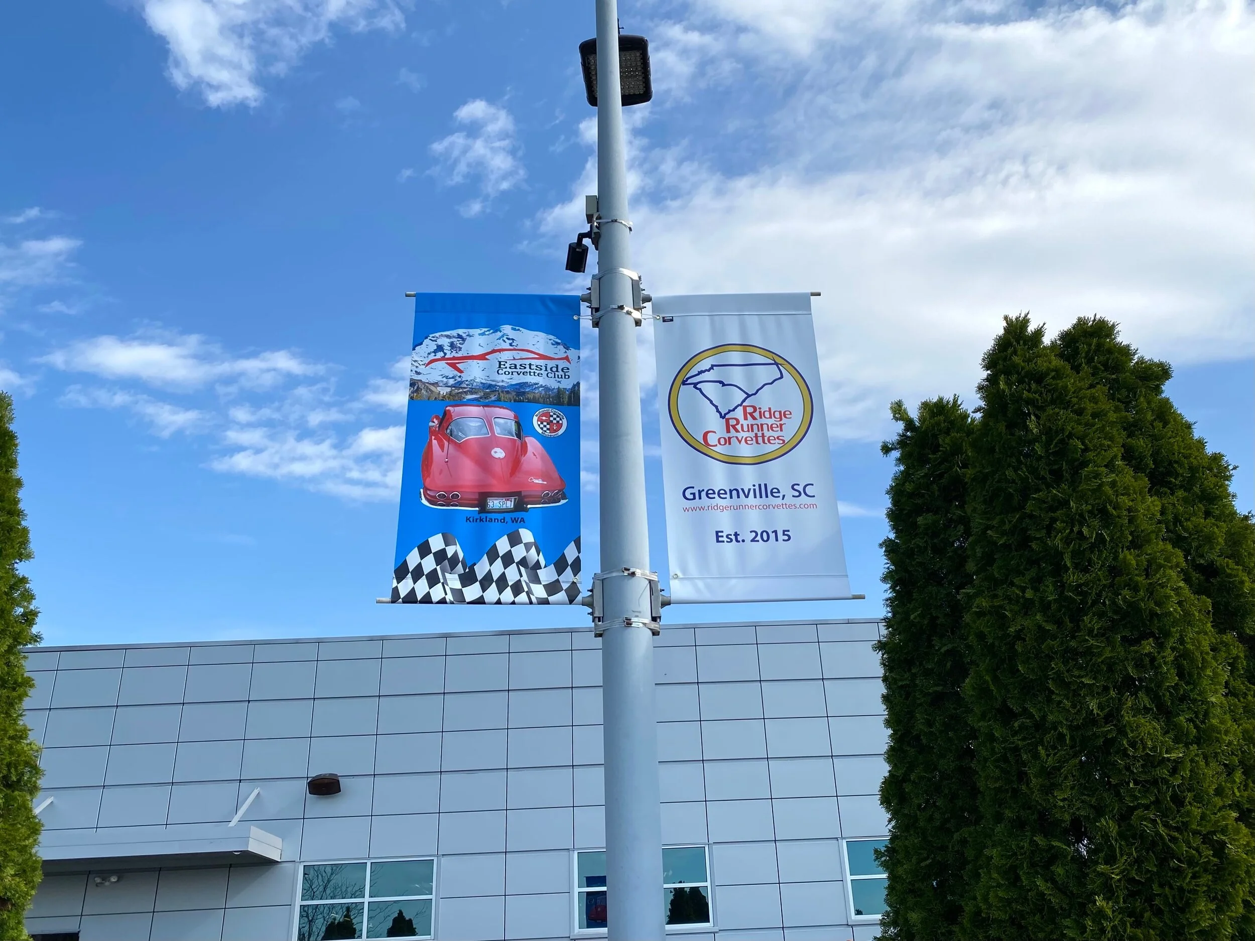 Banner hanging at the National Corvette Museum from APRIL of 2021 to March of 2022