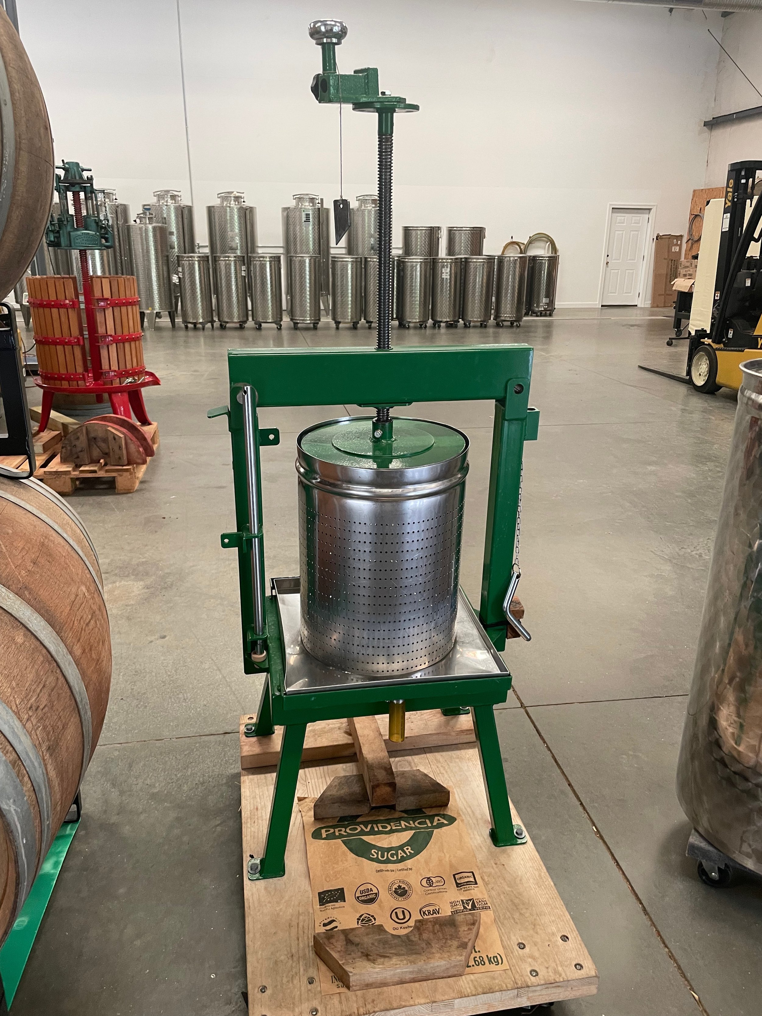 Depending on the material to be pressed, a small or large press may be used - this is the small Vicario press - the material left after pressing is used to condition the soil on the farm