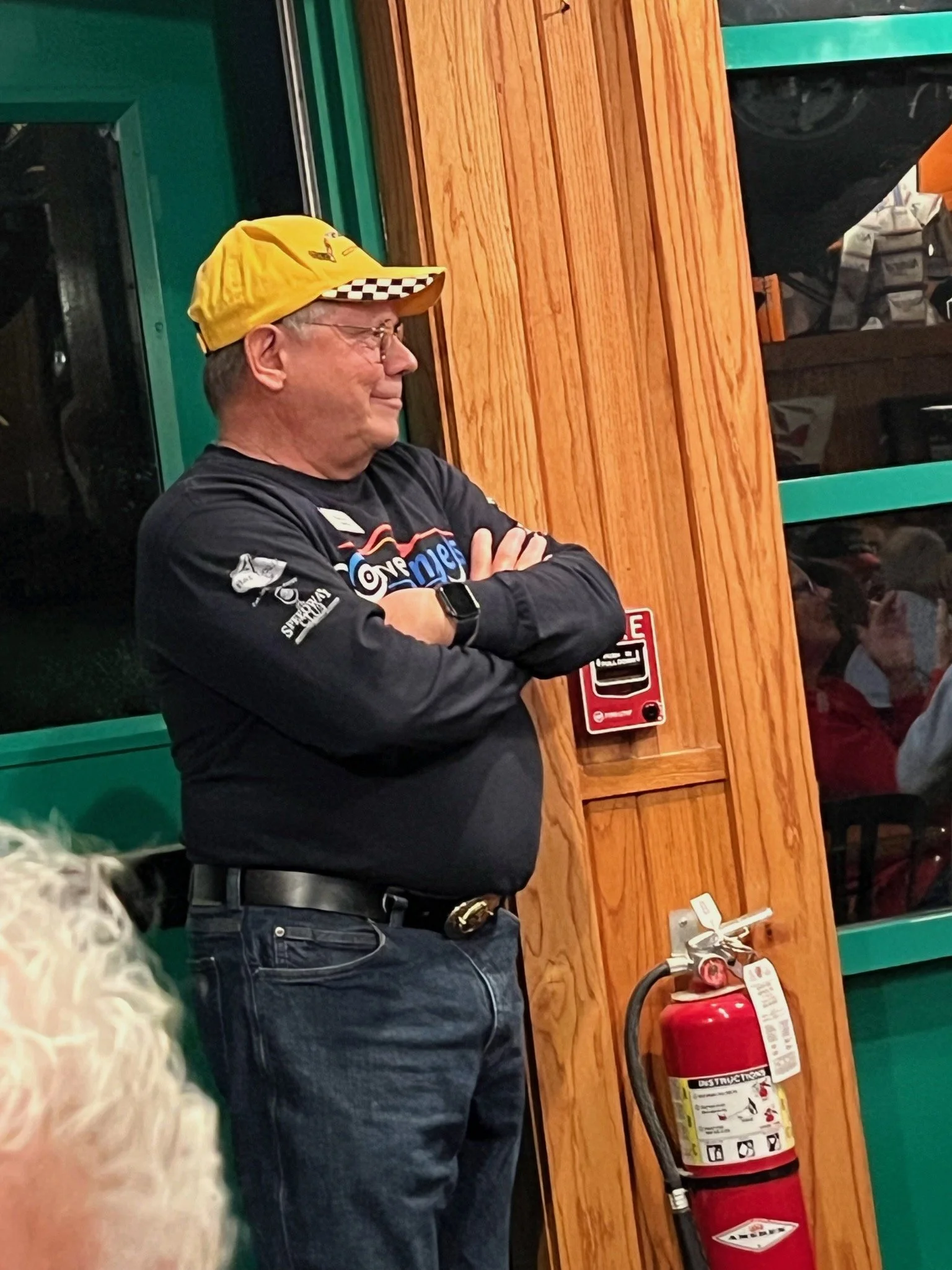 Dave Smits was re-elected to another term as Treasurer.  He is presented with an award hand made by member Gary Phillips