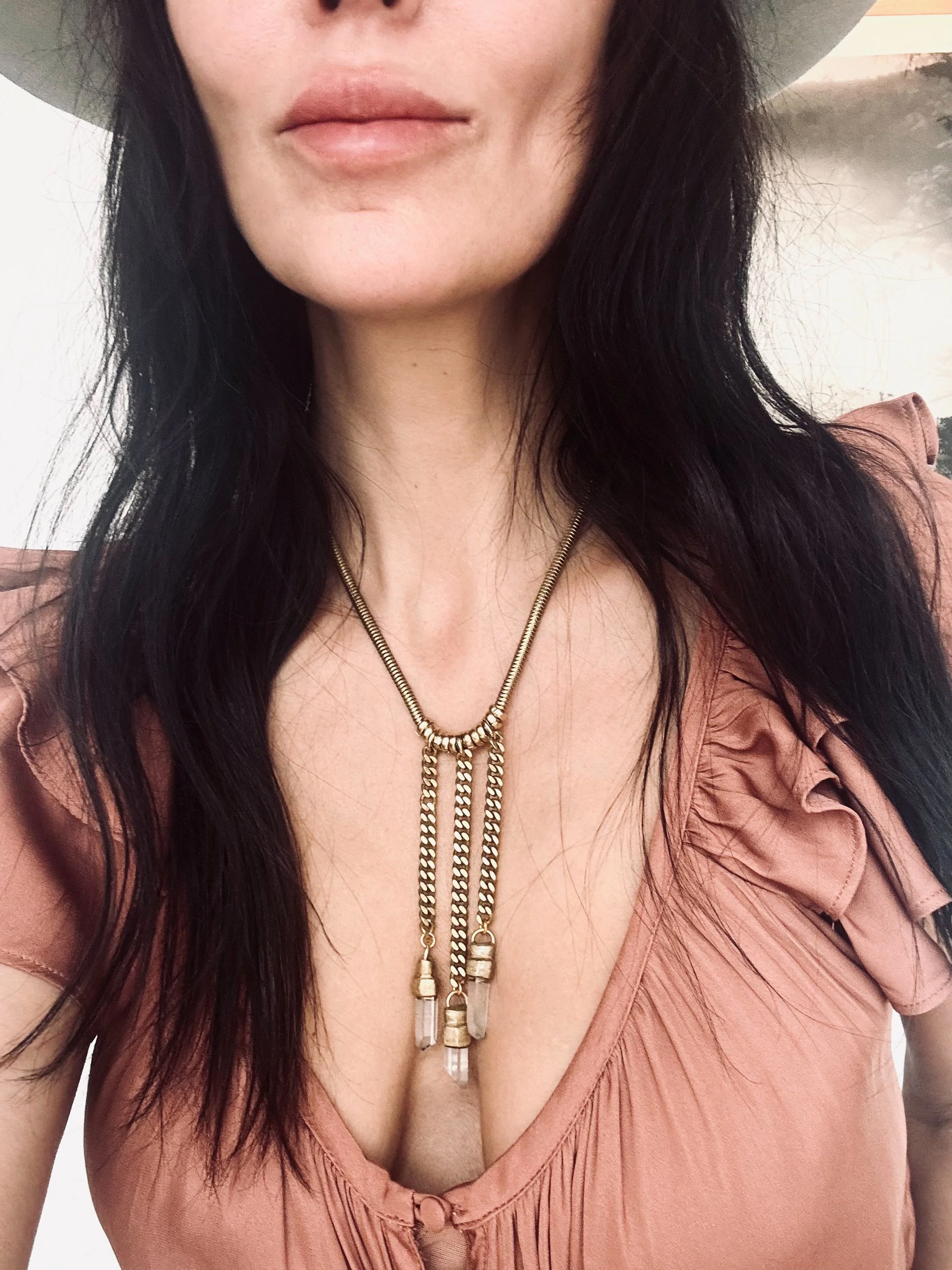 Mistral-armed with ardor-quartz crystal necklace-on