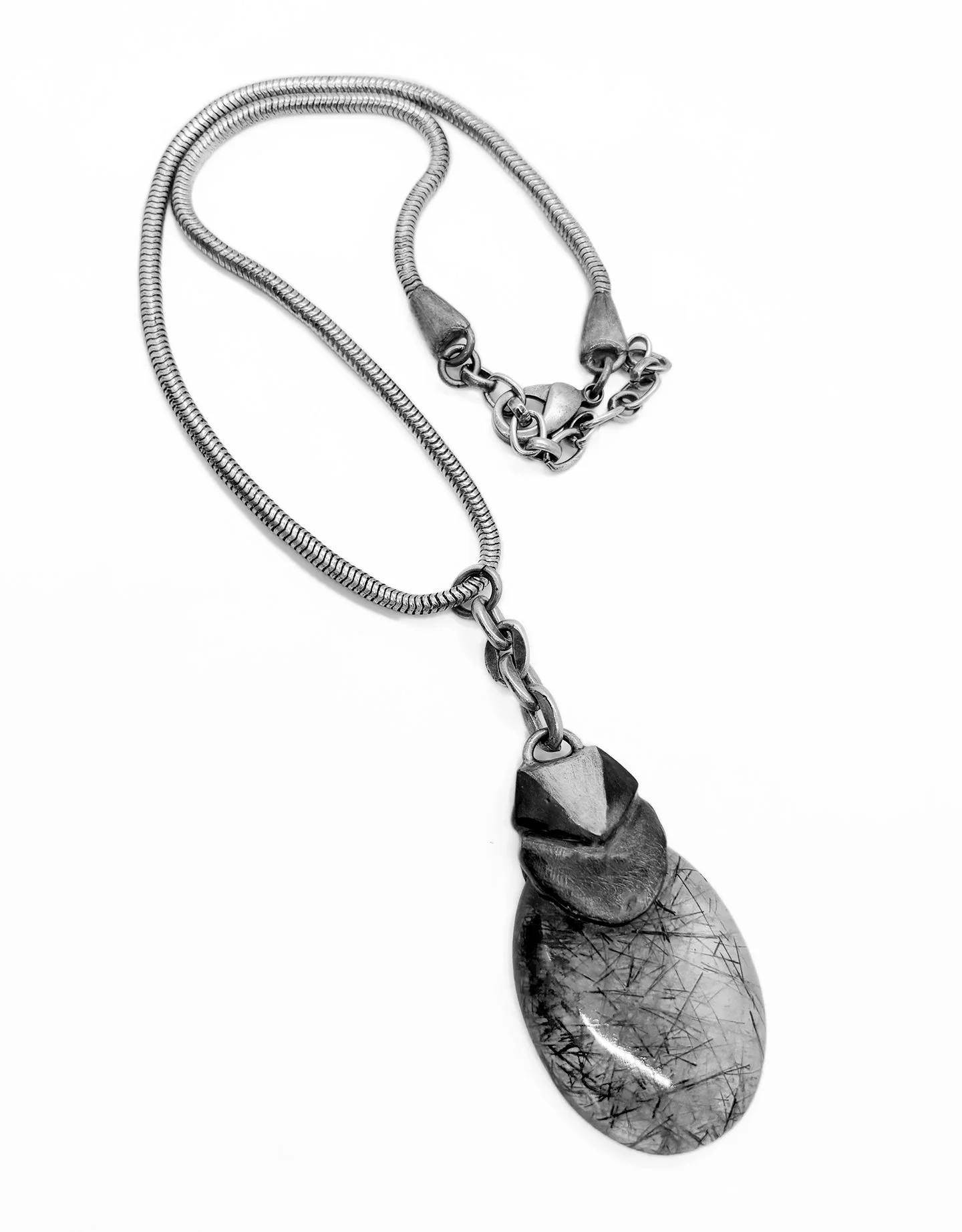 Evita-armed with ardor-rutilated quartz necklace.jpeg