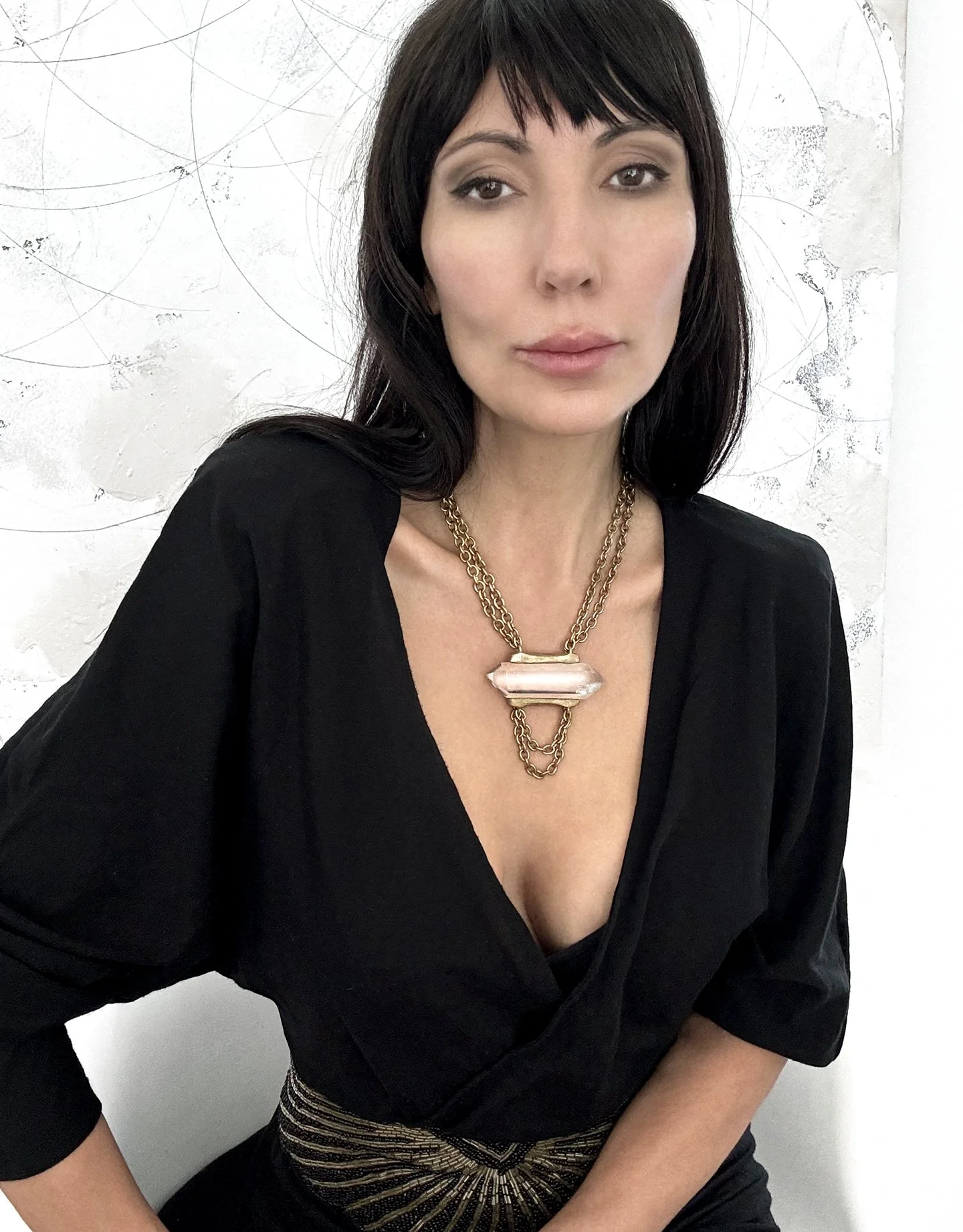 Nirvana-armed with ardor-quartz crystal necklace-on.jpeg