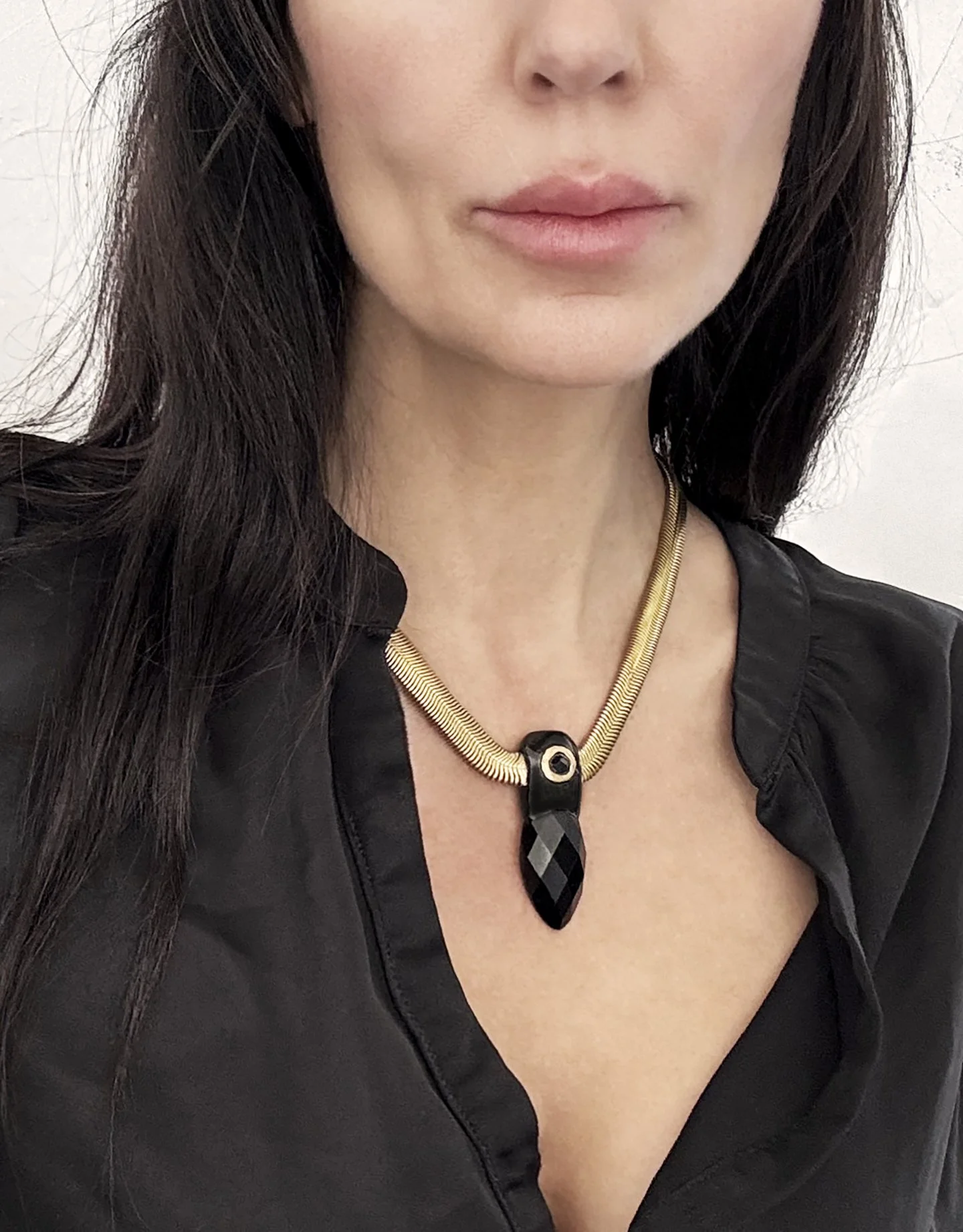 Phoenix-armed with ardor-onyx necklace-on.jpeg