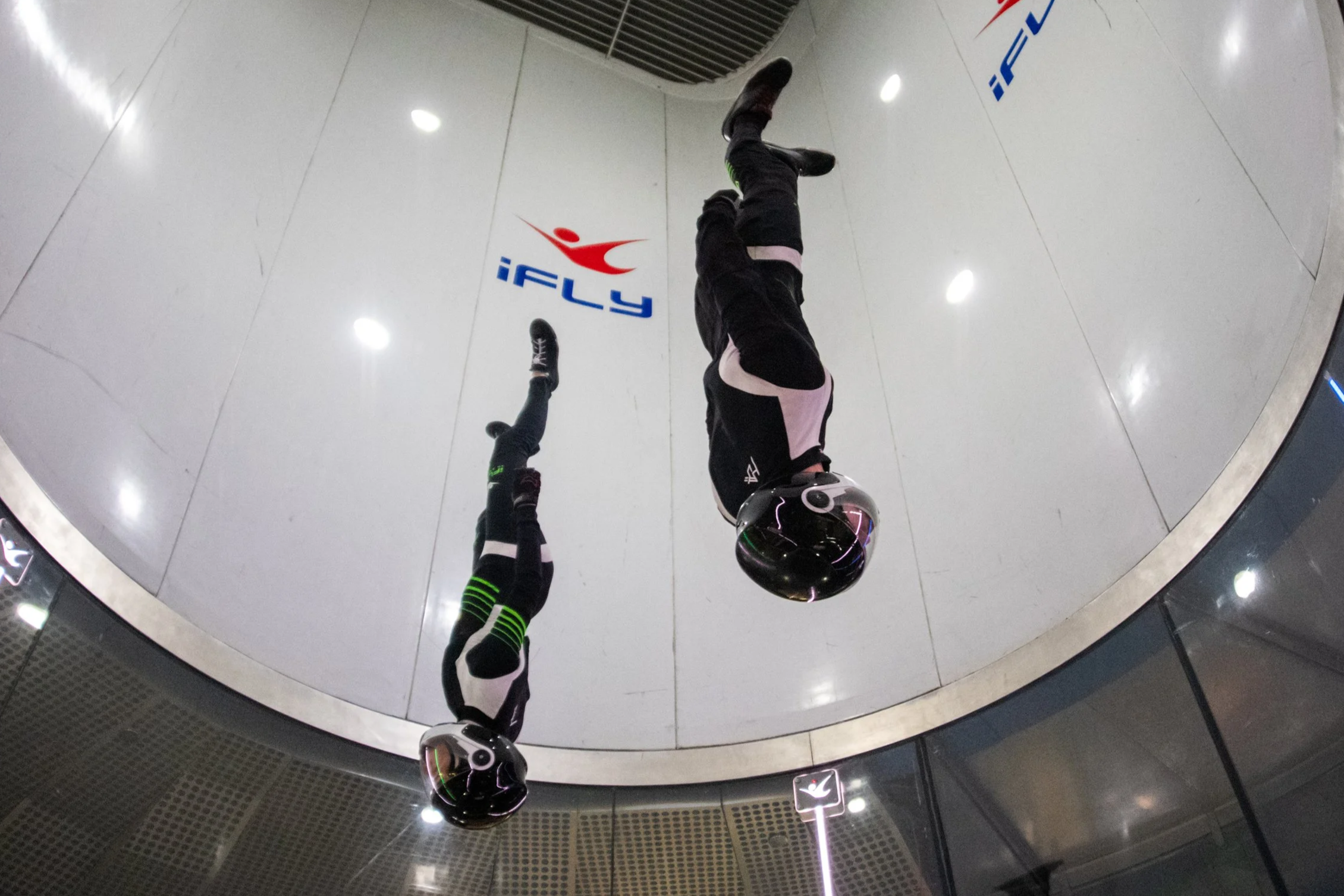 A skydiving dynamic 2-way team flying together in the wind tunnel.