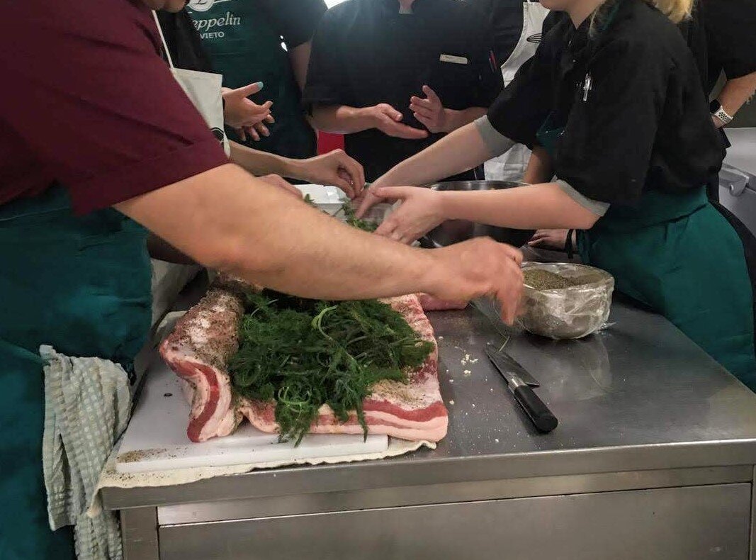 rolling porchetta.jpg