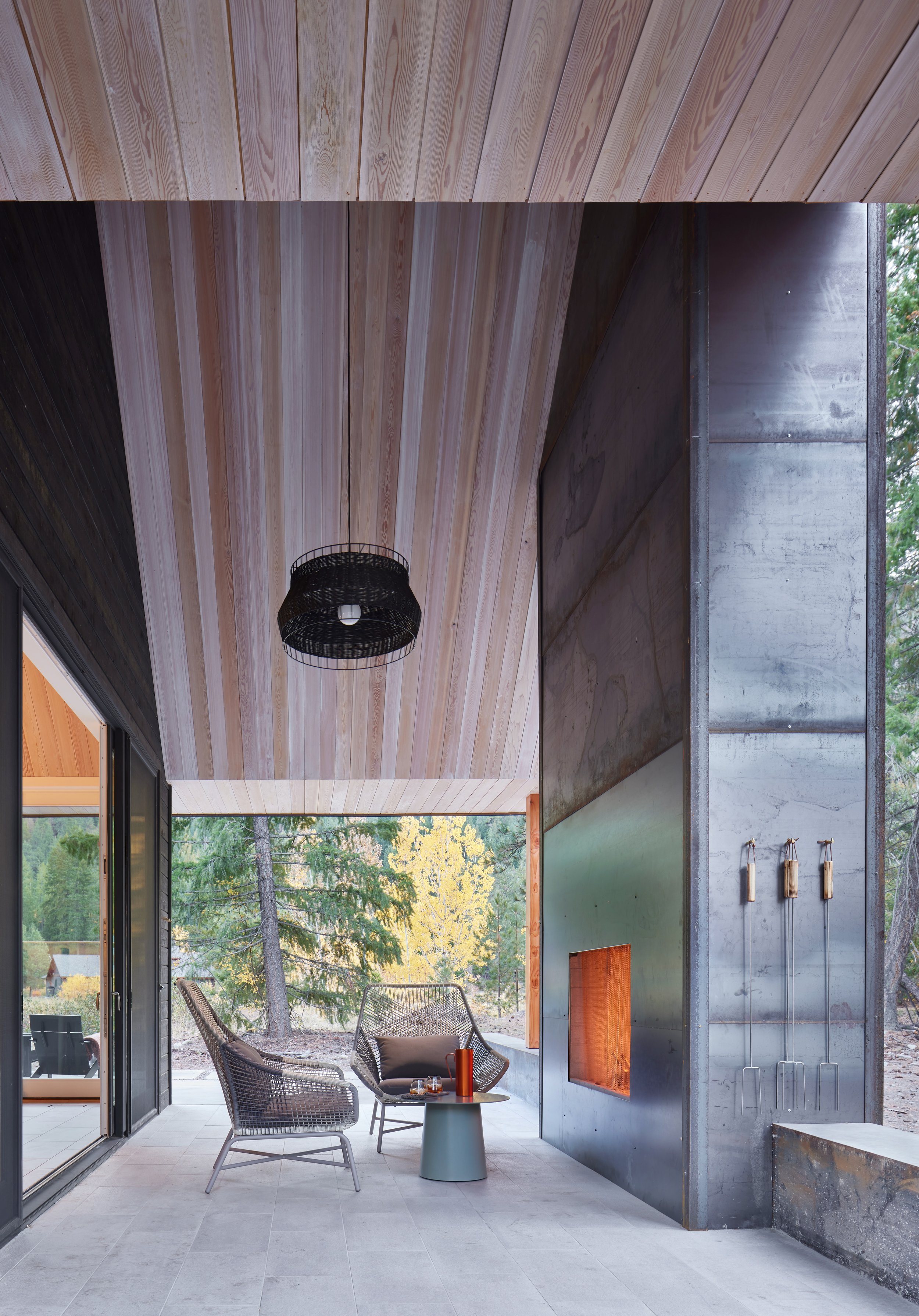 Covered porch with outdoor wood fireplace