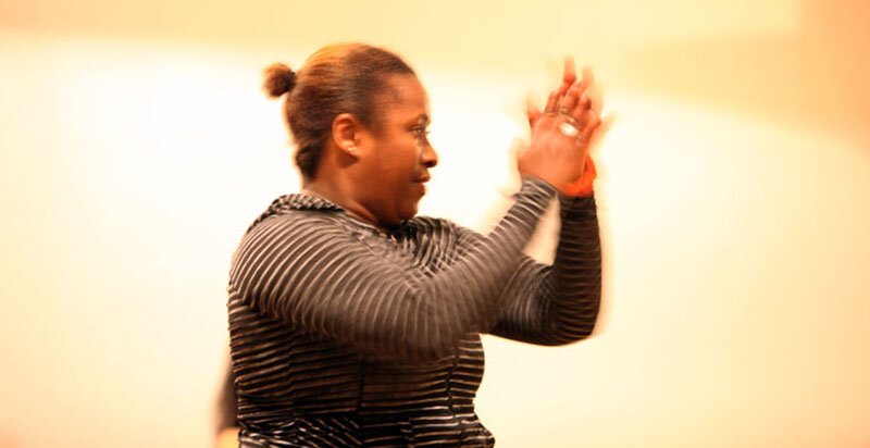  Afro-Cuban dance teacher Susana Arenas Pedroso claps a rhythm for her students.  Photo Credit: Tom Levy   