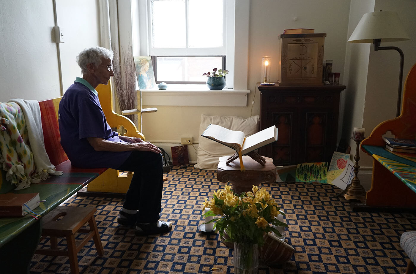  Sister Pat Murphy sits in Su Casa, a monastery which they’ve converted into a home for migrants who have survived torture.  Photo Credit: Heidi Shin 