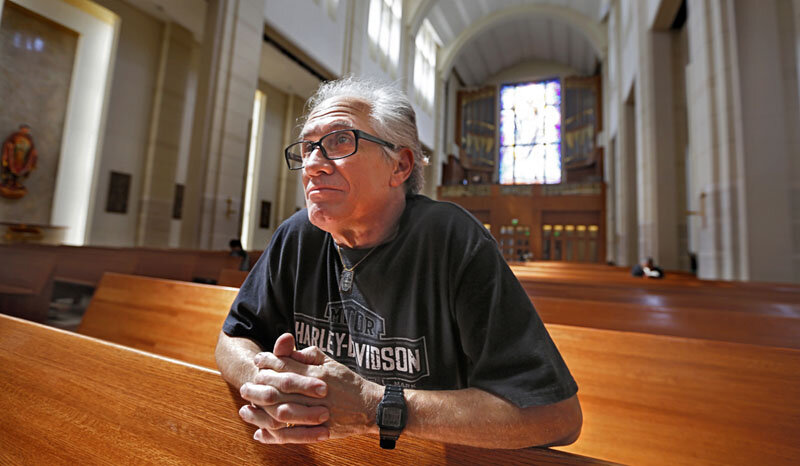  Miguel Prats reflects in the sanctuary of the Co-Cathedral of the Sacred Heart Catholic Church in downtown Houston. Prats, a longtime member of the Catholic church, started a support group for victims of abuse.    Photo Credit: Annie Mulligan 