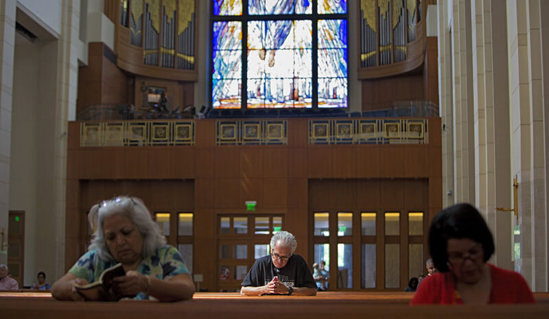  Miguel Prats prays in the sanctuary of the Co-Cathedral of the Sacred Heart Catholic Church in downtown Houston. Prats, a longtime member of the Catholic church, started a support group for victims of abuse.    Photo Credit: Annie Mulligan  