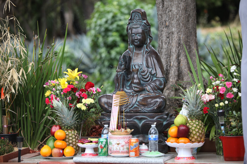  Kuan Yin, the goddess of compassion, is also part of the shrine.   Photo Credit: Tom Levy 