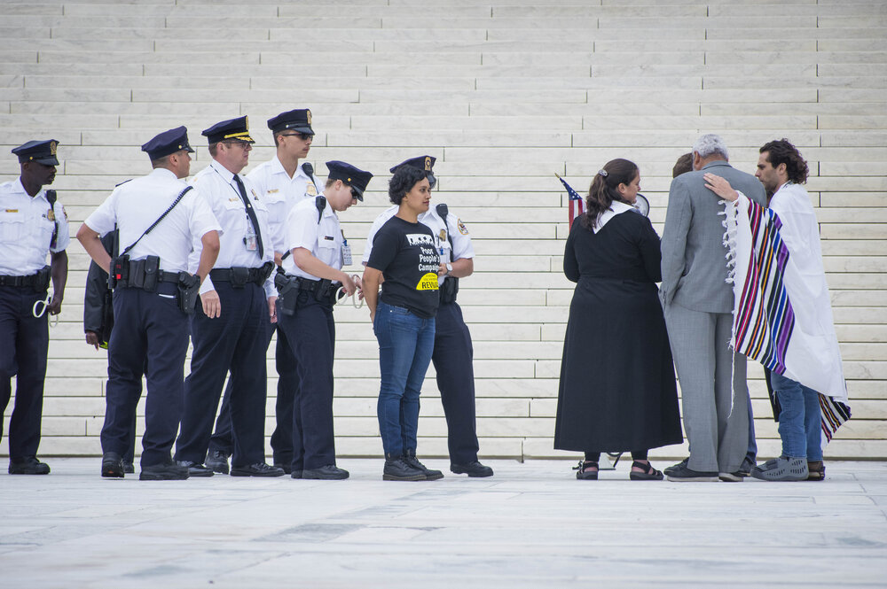 Shailly Gupta Barnes is arrested during a protest at the United States Supreme Court in June 2018
