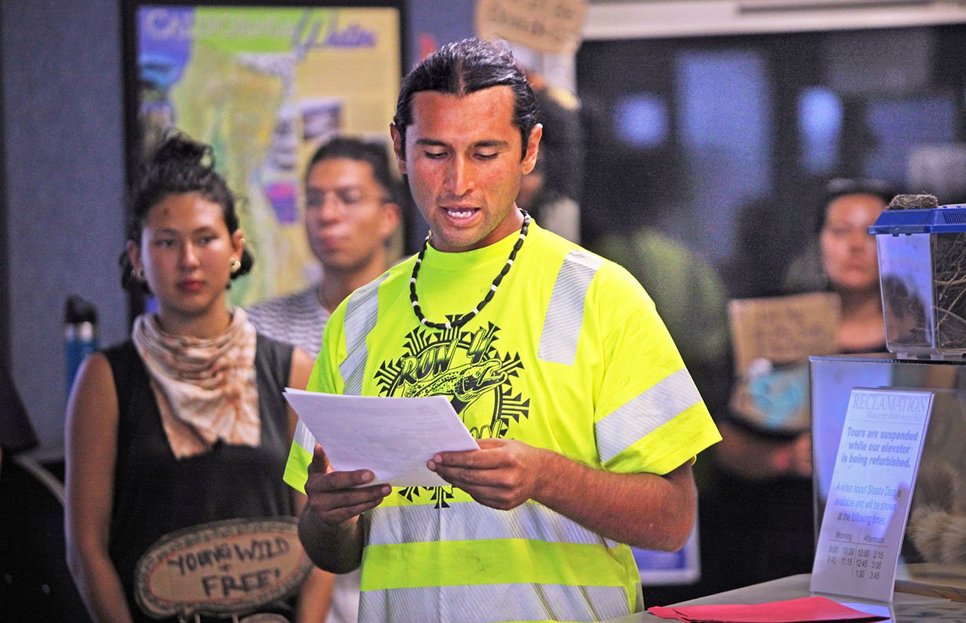  Shasta Lake, CA — Michael Preston reads a letter outlining the Winnemem Wintu’s demand for a display that would educate the public about the destruction to the land, salmon and indigenous people brought on by Shasta Dam. September 25, 2019. Tom Levy