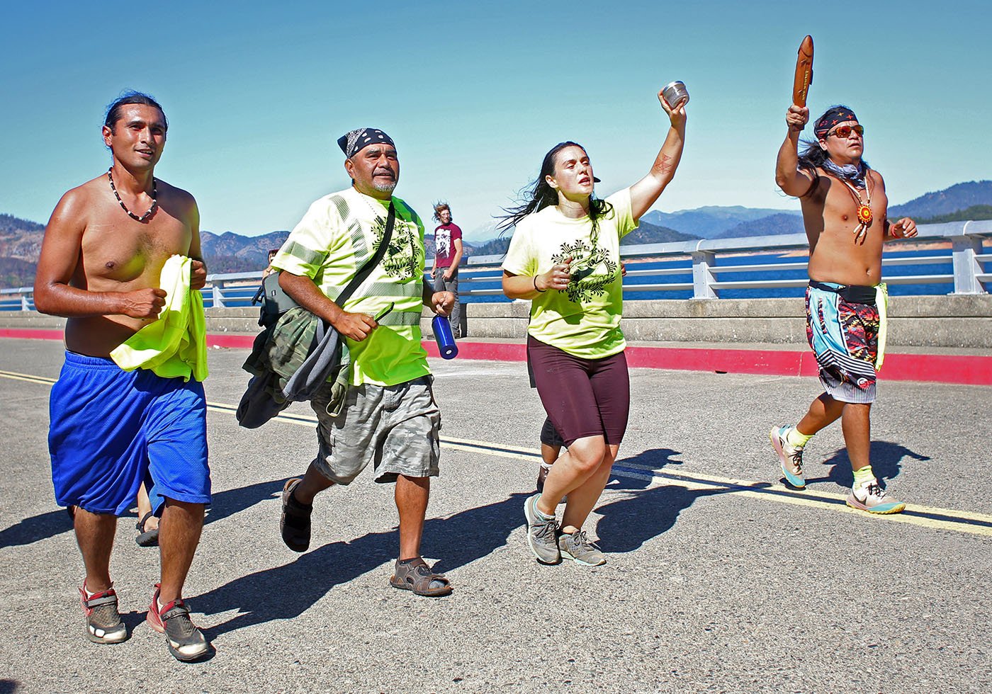  Shasta Lake, CA — Run4Salmon participants finish a stretch that started in the early morning along the Trinity River and ended at the bridge on top of Shasta Dam.  September 25, 2019. Tom Levy/The Spiritual Edge 
