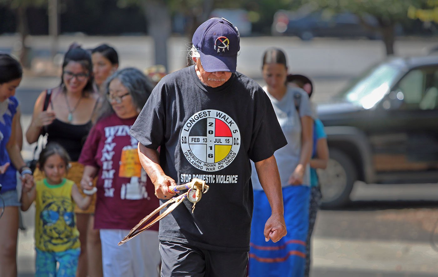  East Bay, CA — Wounded Knee DeOcampo (Miwok, Sierra foothills) walks in prayer, leading the Run4Salmon. September 11, 2017. Tom Levy/The Spiritual Edge 