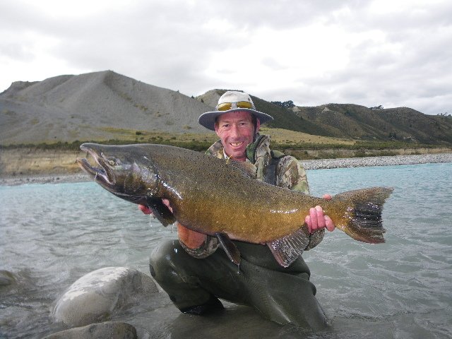  Rakaia River, New Zealand — Dirk Barr is a fish culturist who has supported Winnemem Wintu efforts to return New Zealand Salmon to the McCloud River. Here, he holds a 30-pound Chinook salmon. 2009. Photo: Courtesy of Dirk Barr 