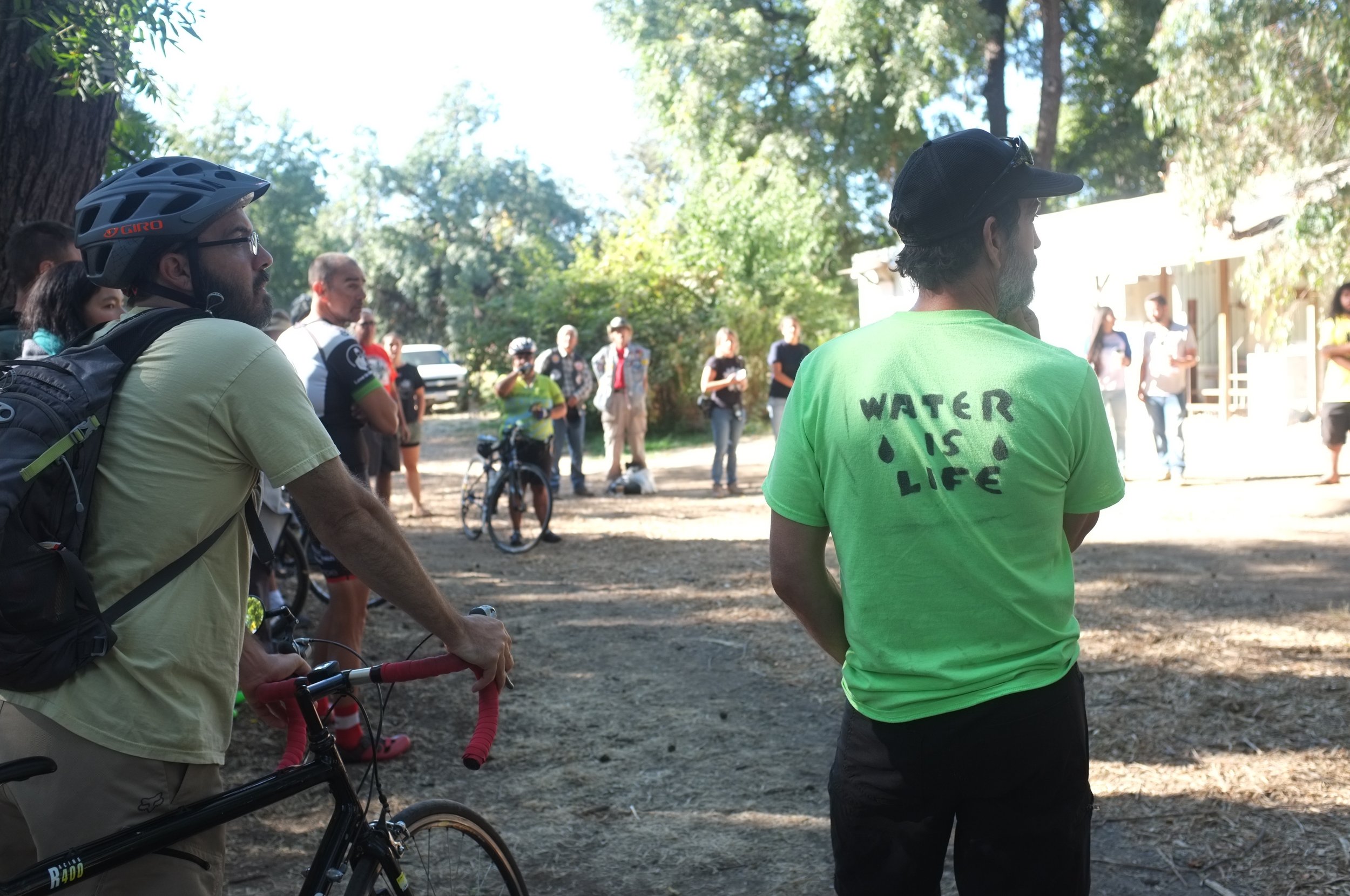  Butte County, CA — Ron Toppi (right) waits for the second day of Run4Salmon biking to begin. The route will take them through the town of Chico and then north along the Sacramento River. September 24, 2018. Judy Silber/The Spiritual Edge  