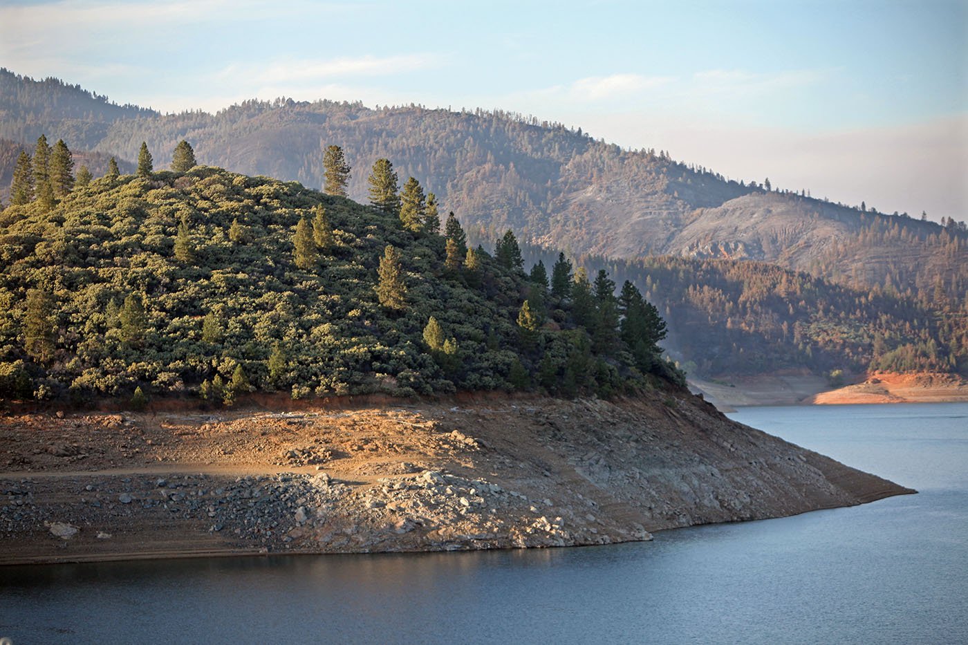  Shasta Reservoir — When the water level dips below full capacity, it forms a “bathtub ring” all the way around Shasta Reservoir. July 12, 2021. Tom Levy/The Spiritual Edge   