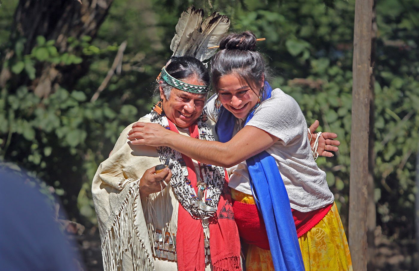  Shasta-Trinity National Forest — Chief Caleen Sisk receives a hug from Run4Salmon organizer Niria Alicia. July 11, 2022. Tom Levy/The Spiritual Edge 