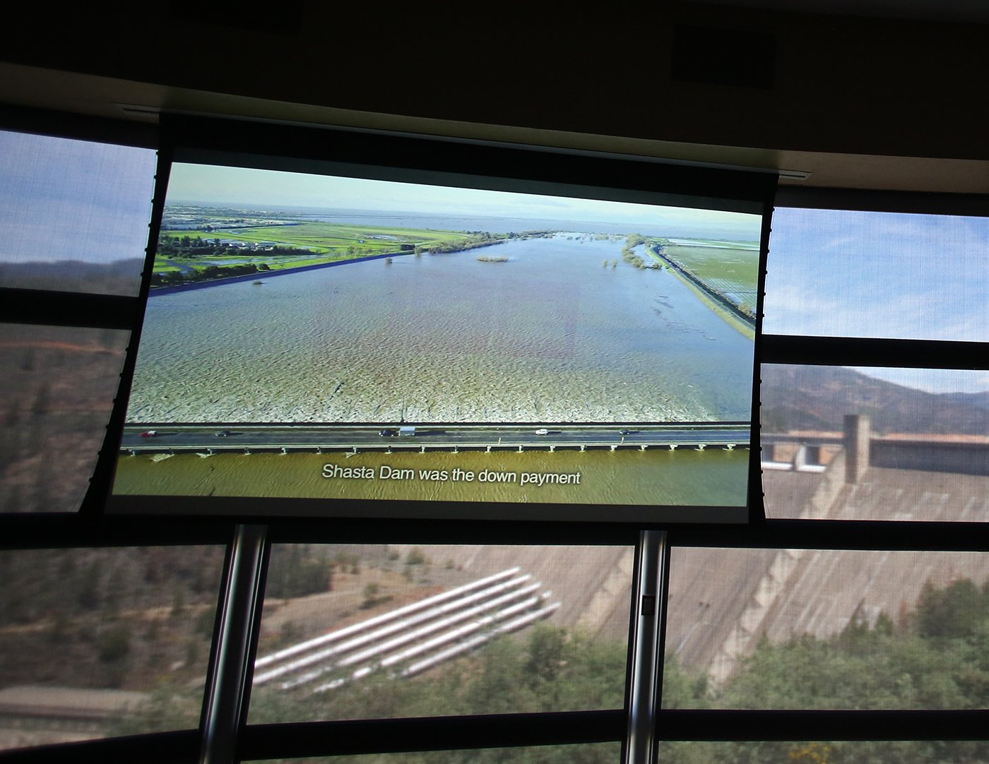  Shasta Lake, CA — A movie that celebrates Shasta Dam and what it made possible for California agriculture plays on repeat at the Visitor Center. September 25, 2019. Tom Levy/The Spiritual Edge 