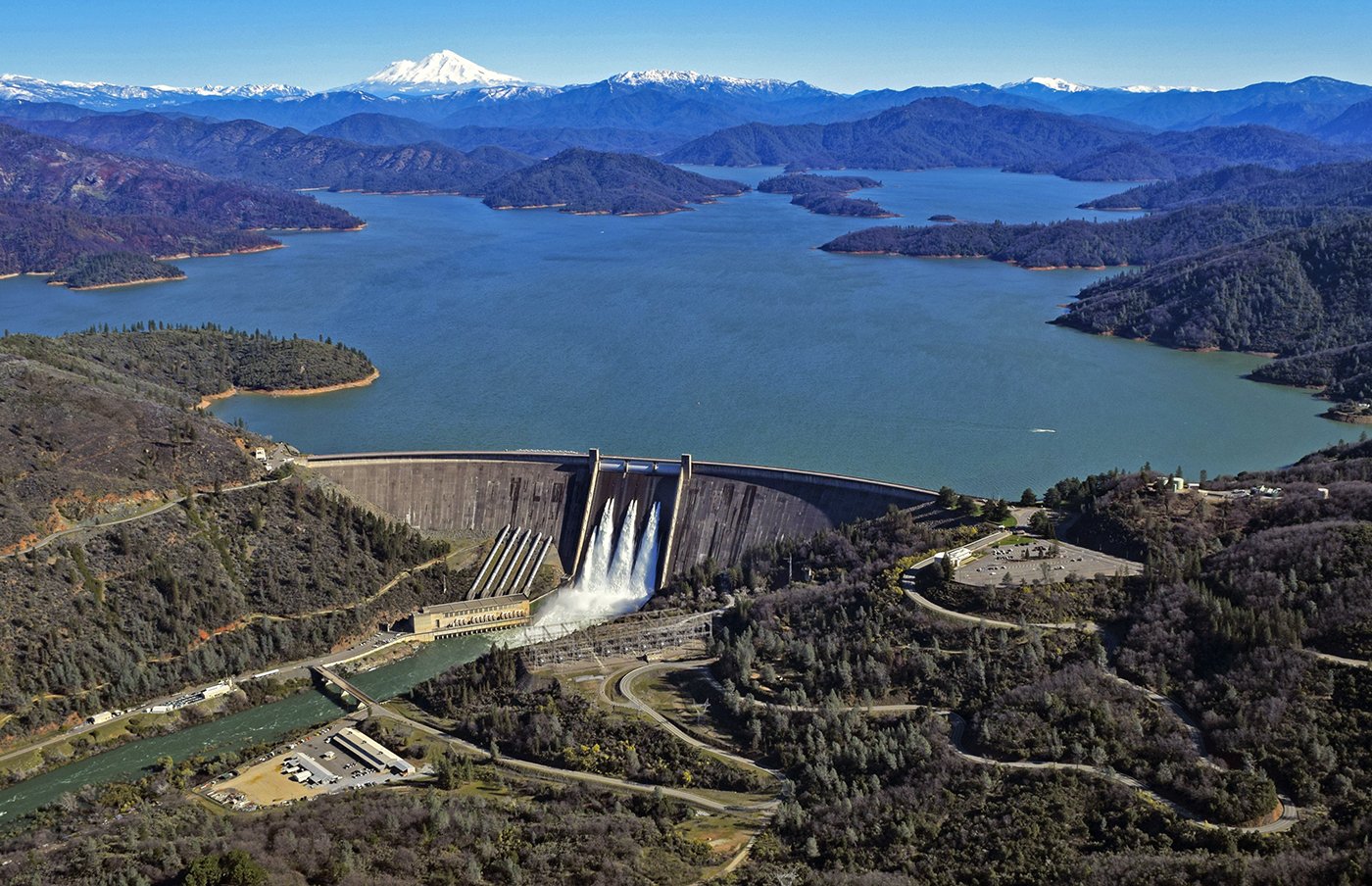  Shasta Lake, CA — Aerial view of Shasta Dam with Mt. Shasta in the background. March 11, 2019. Photo: U.S. Bureau of Reclamation 