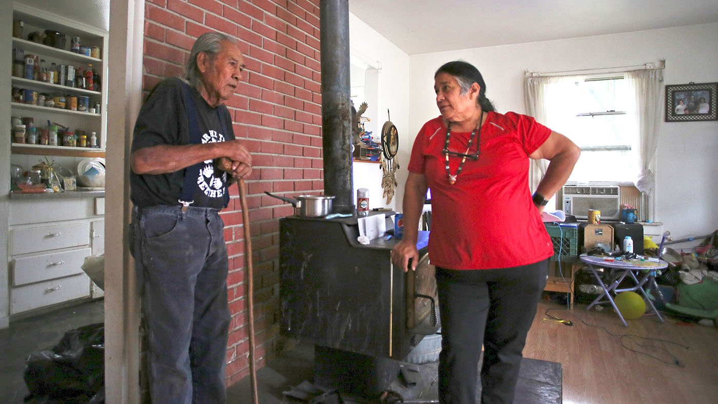  Hayfork, CA — Chief Caleen Sisk speaks with Bob Burns at his home. He helped raise she and her sisters for a time when they were young. May 25, 2019. Tom Levy/The Spiritual Edge 