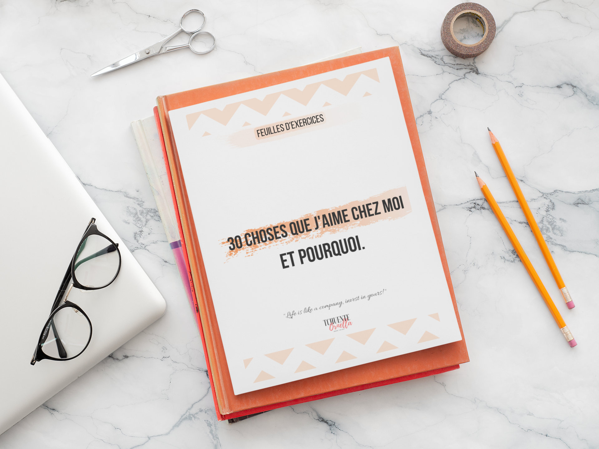 sticker-mockup-featuring-a-notebook-on-a-marble-surface-33622.png
