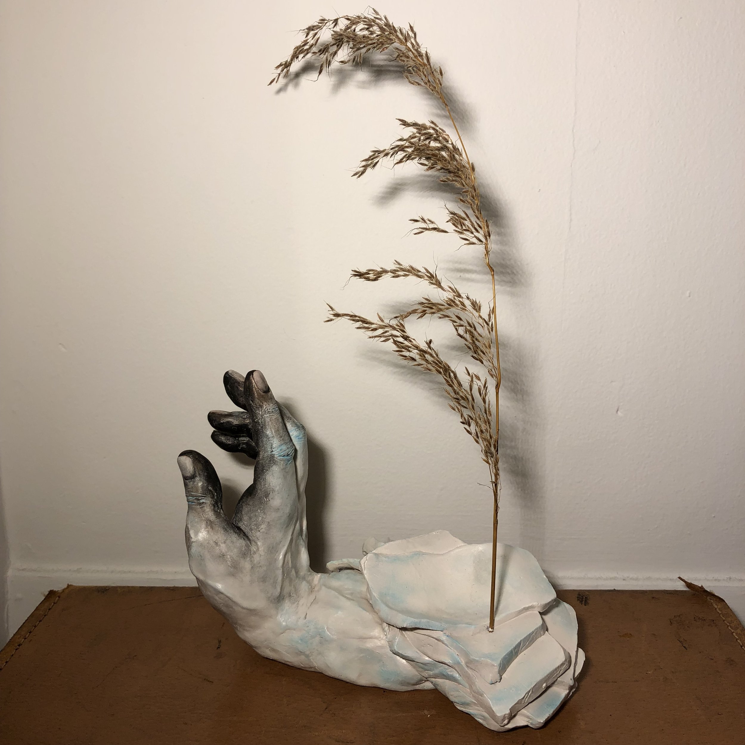 "Dirt," 2021
Sandstone Clay, Acrylic Paint, Charcoal, Eyeshadow, Dried Grass